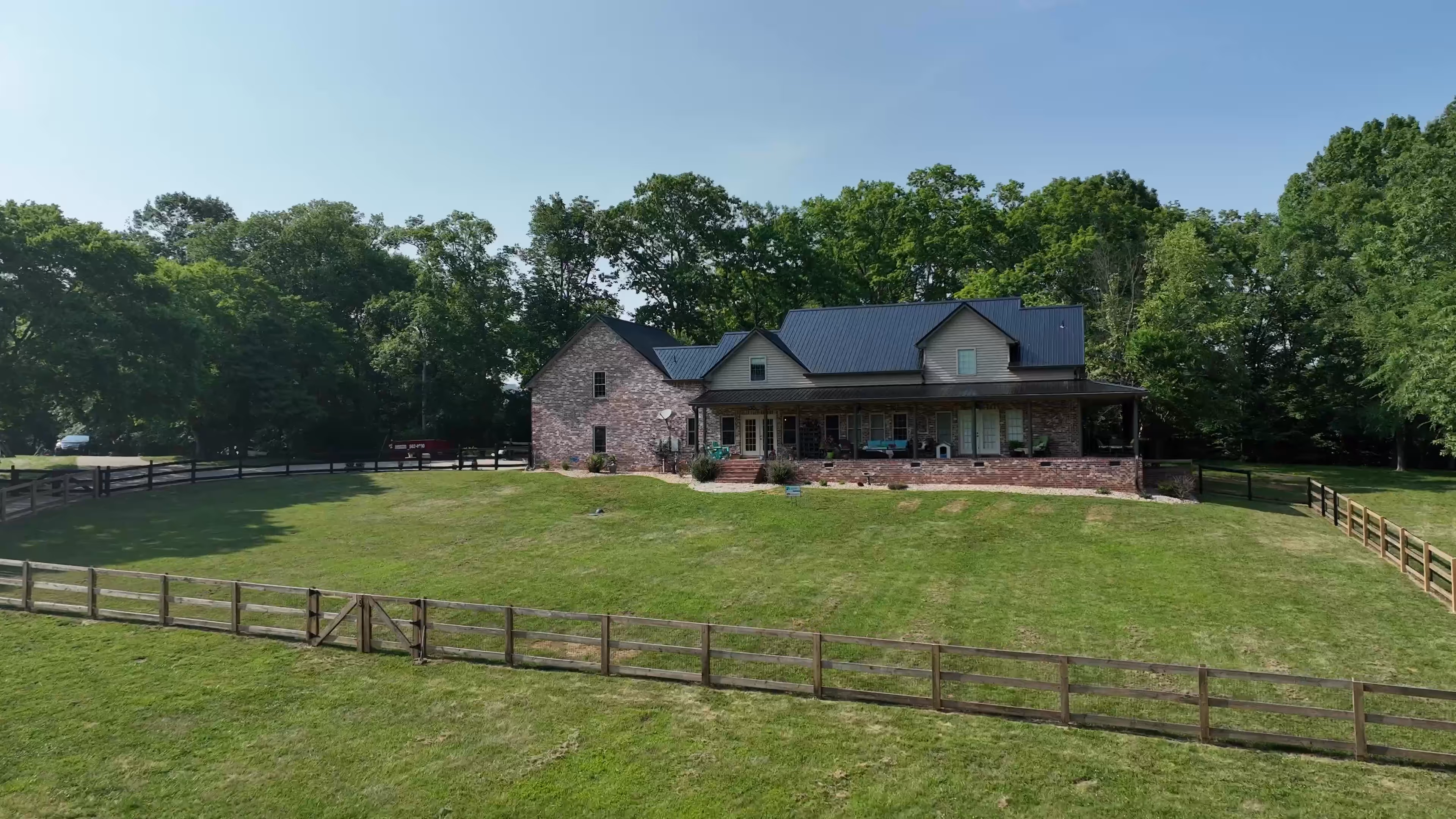 Black Standing Seam Country Home On A Pasture Hill