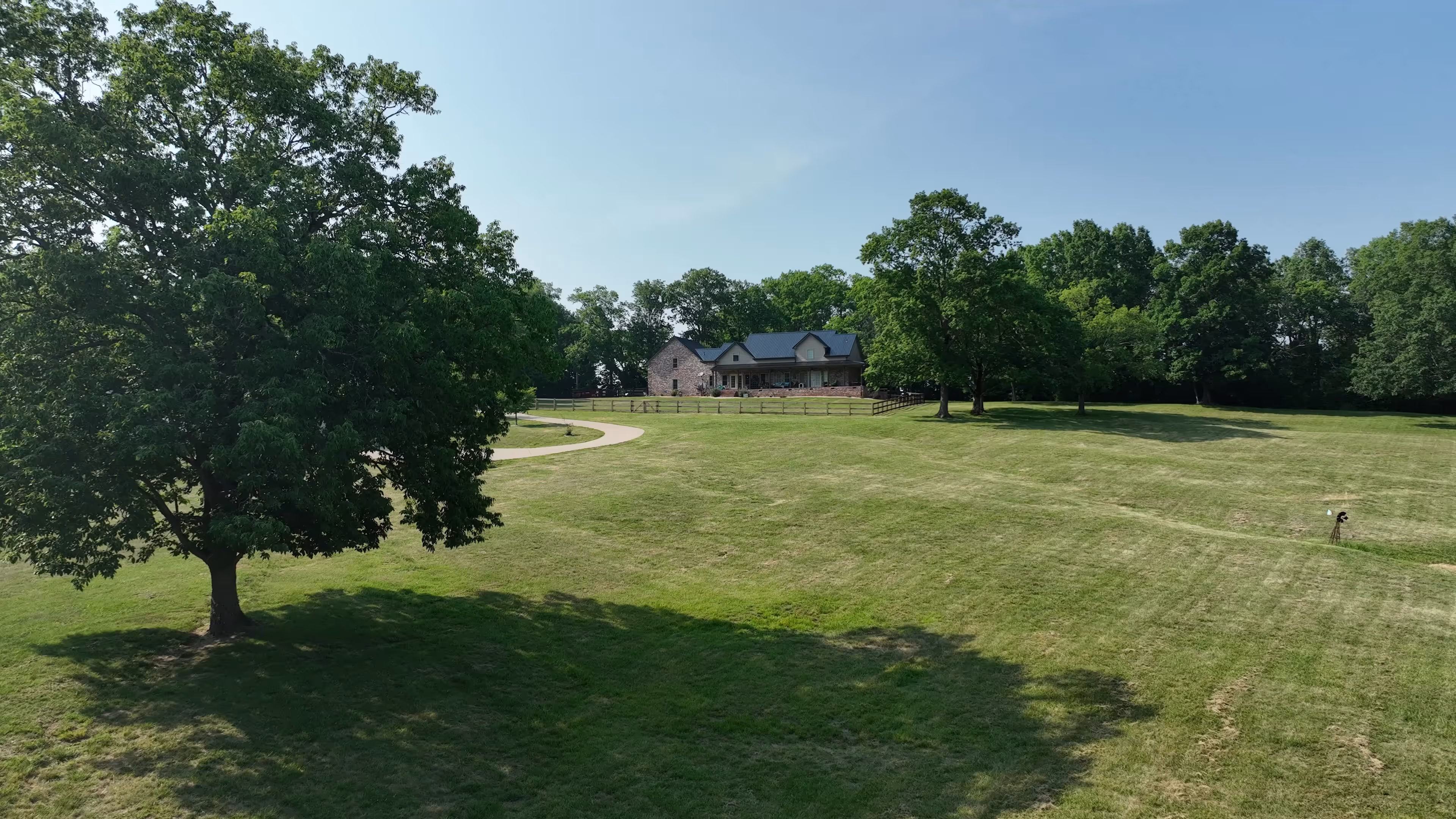 Black Standing Seam Country Home On A Pasture Hill
