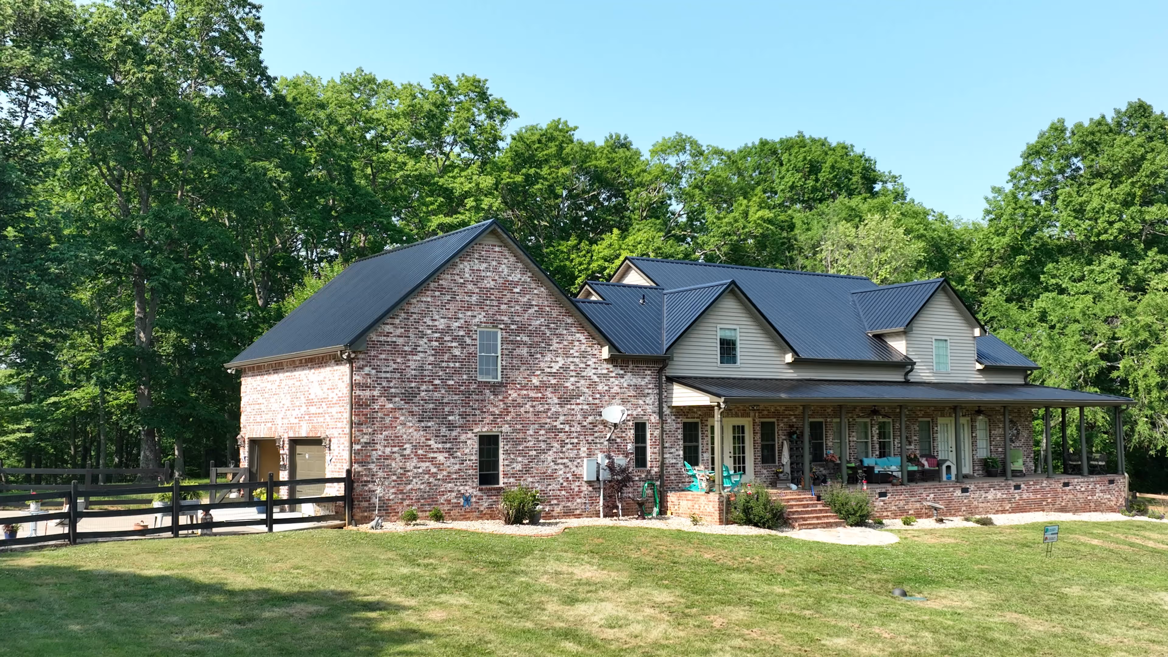 Black Standing Seam Country Home On A Pasture Hill