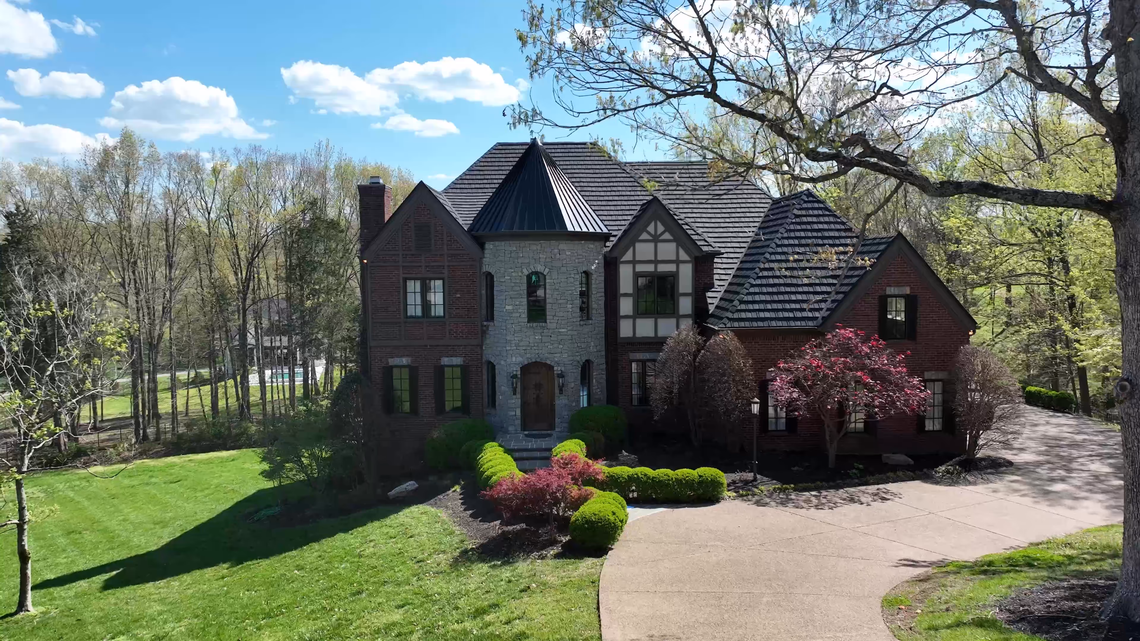 Custom Metal Shingle and Tower on Cottage Home