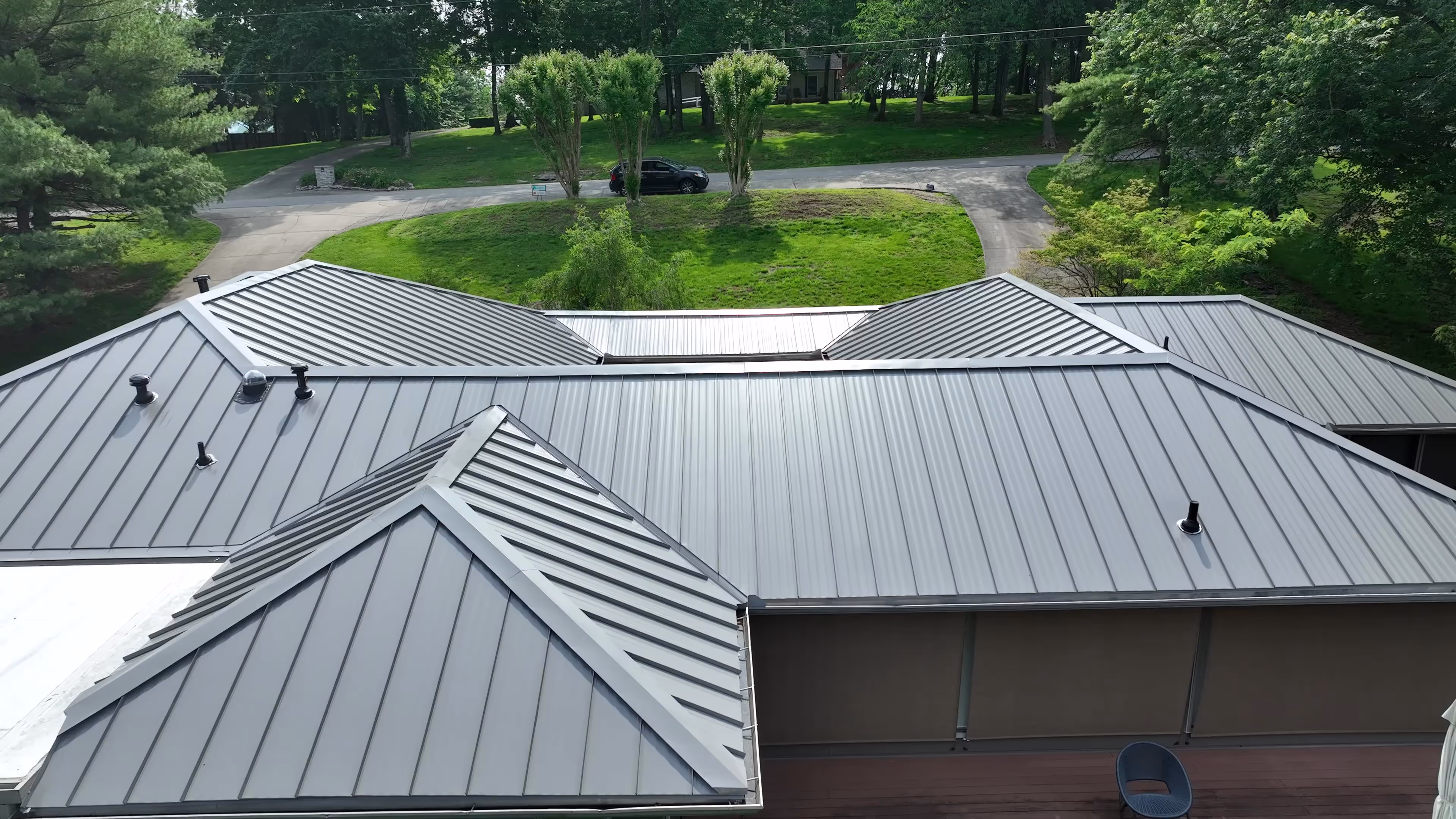 Bronze Standing Seam Courtyard Home