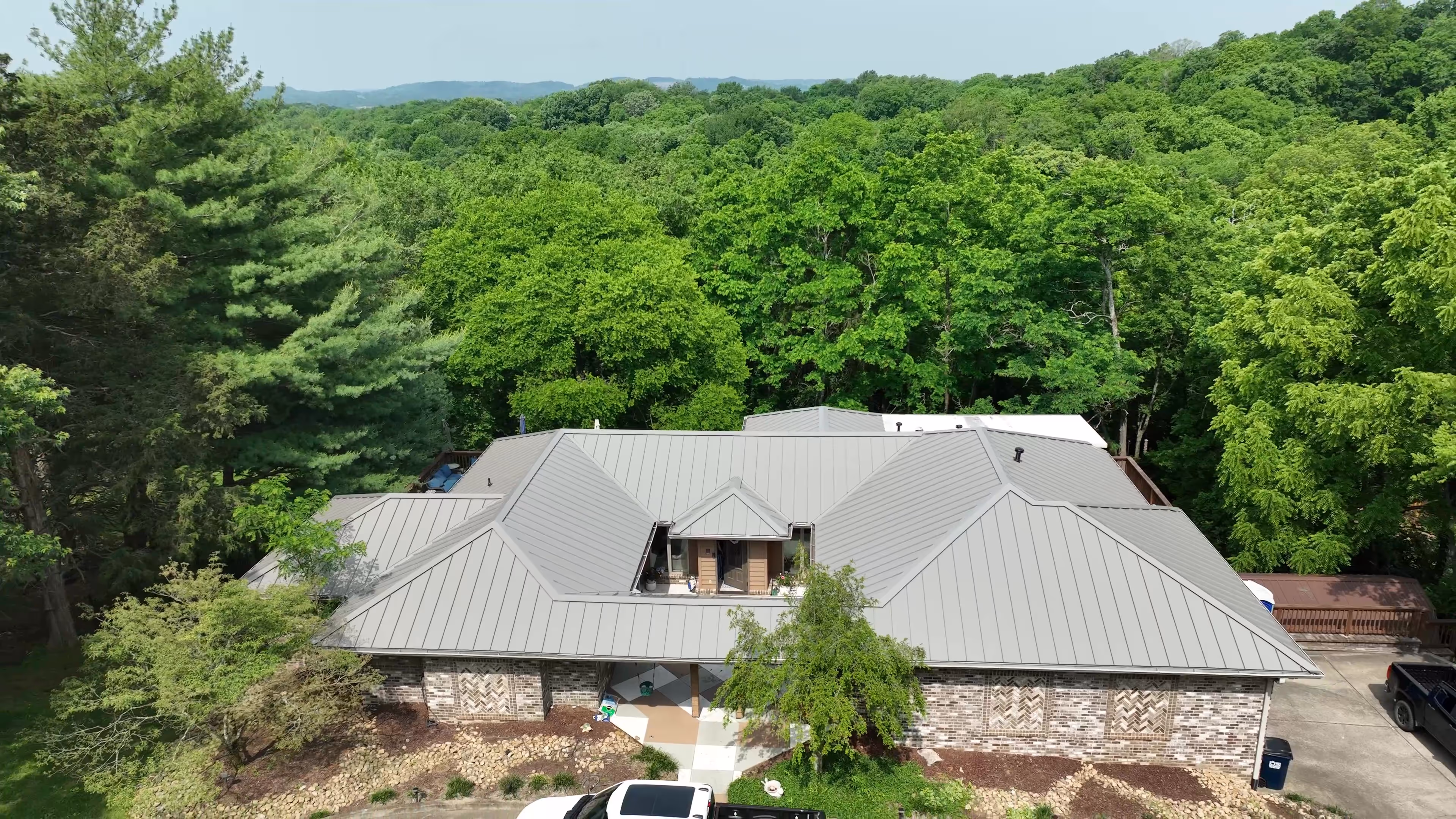 Bronze Standing Seam Courtyard Home