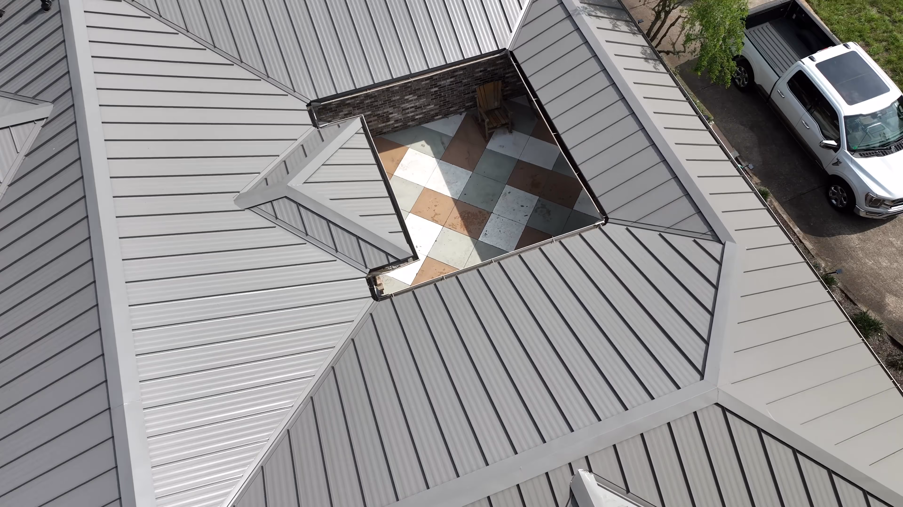 Bronze Standing Seam Courtyard Home