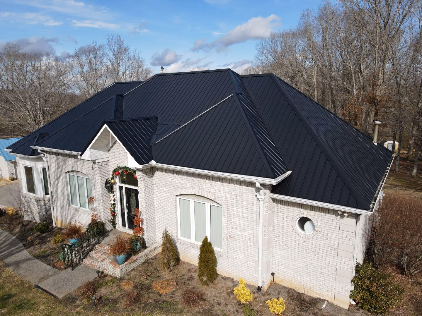 Black Standing Seam Ranch Home