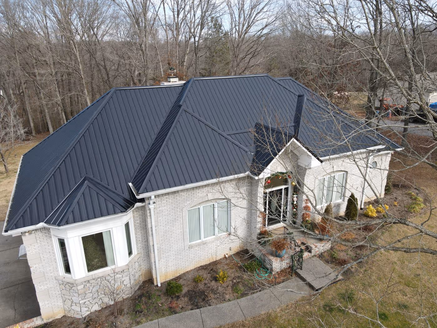 Black Standing Seam Ranch Home