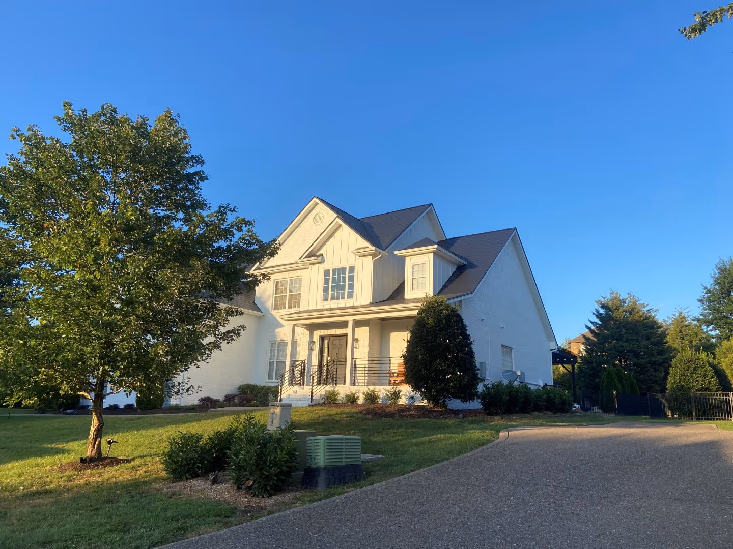 Black Aluminum Shingle Suburban Family Home