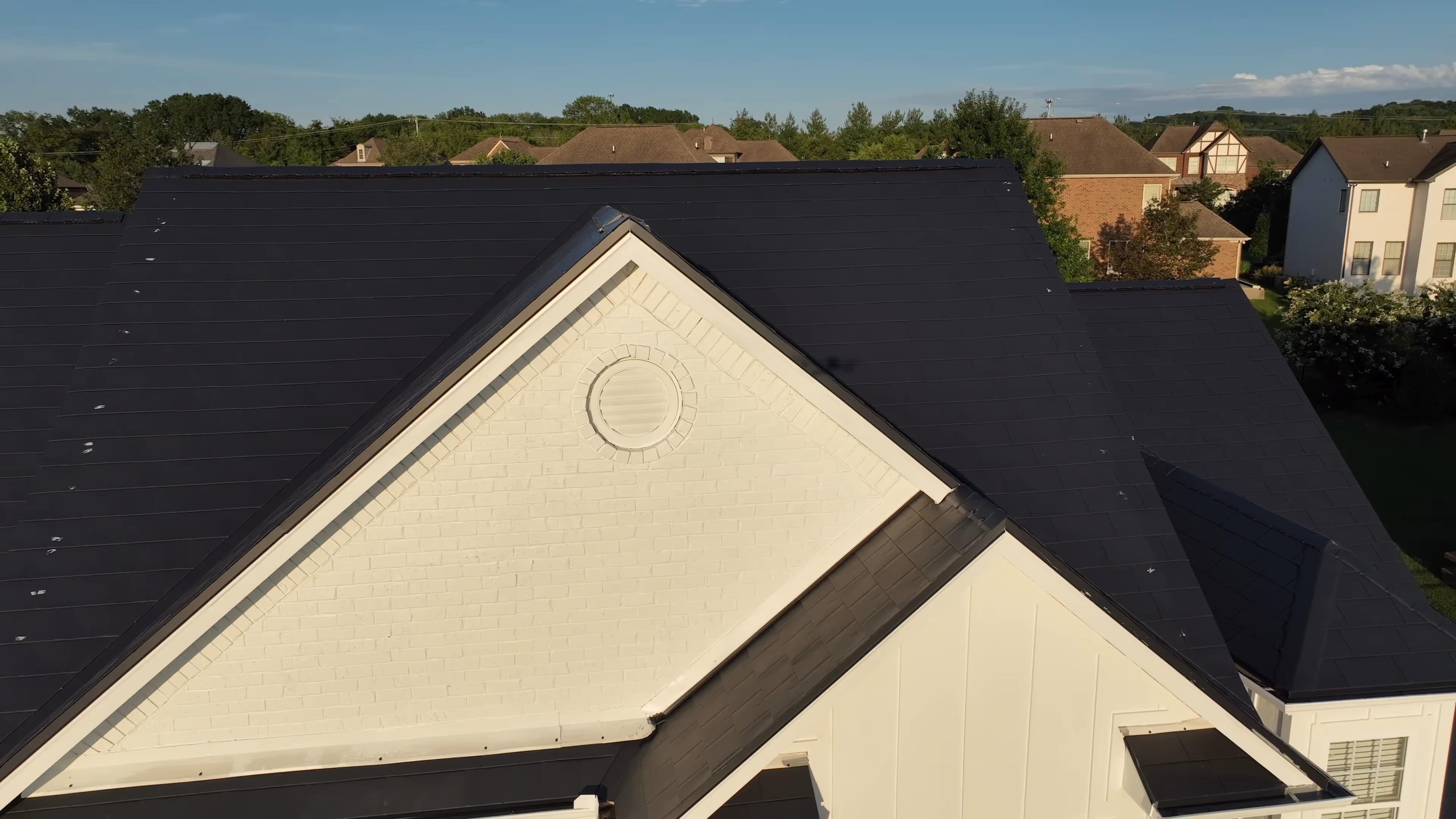 Black Aluminum Shingle Suburban Family Home