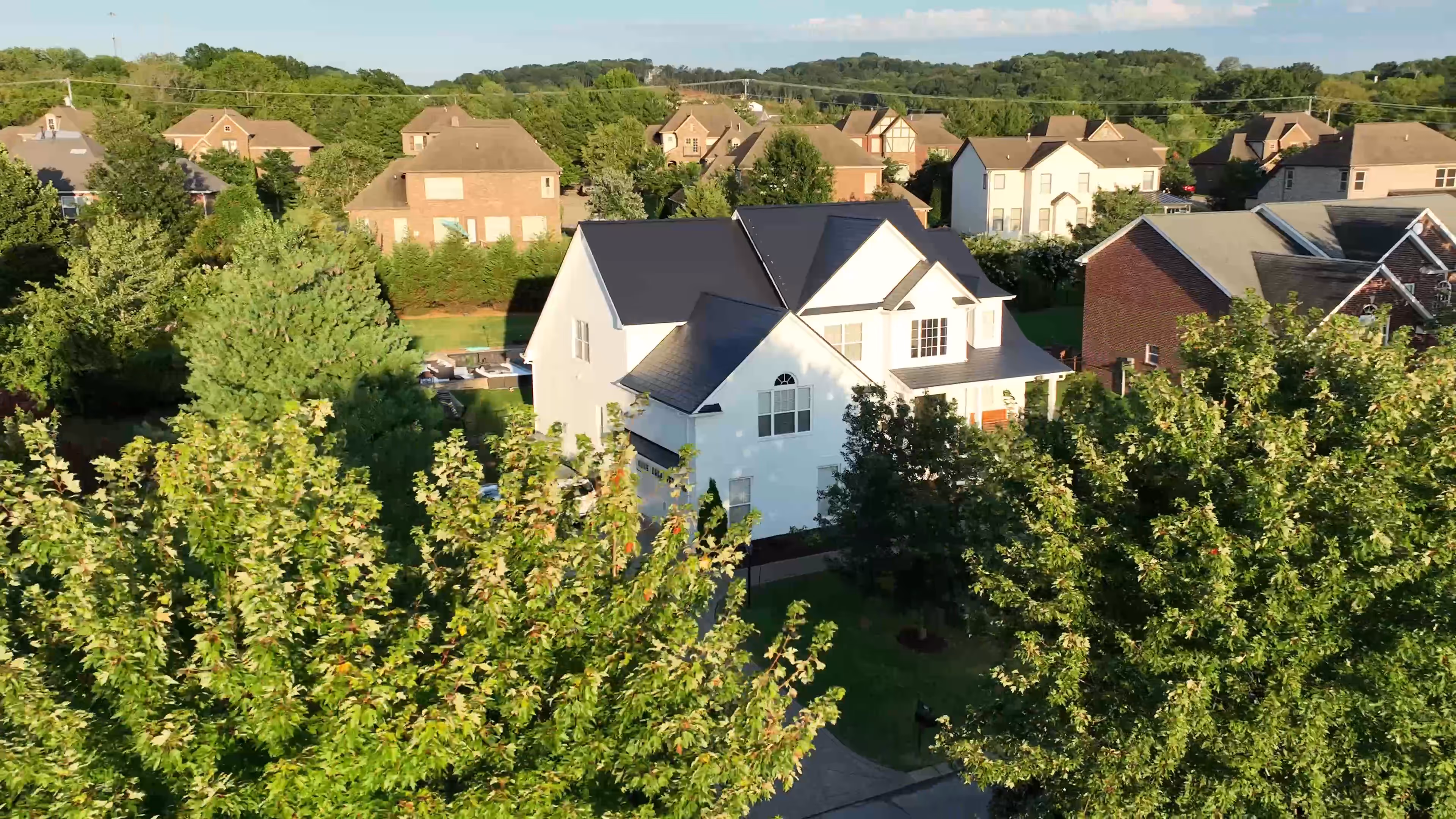Black Aluminum Shingle Suburban Family Home