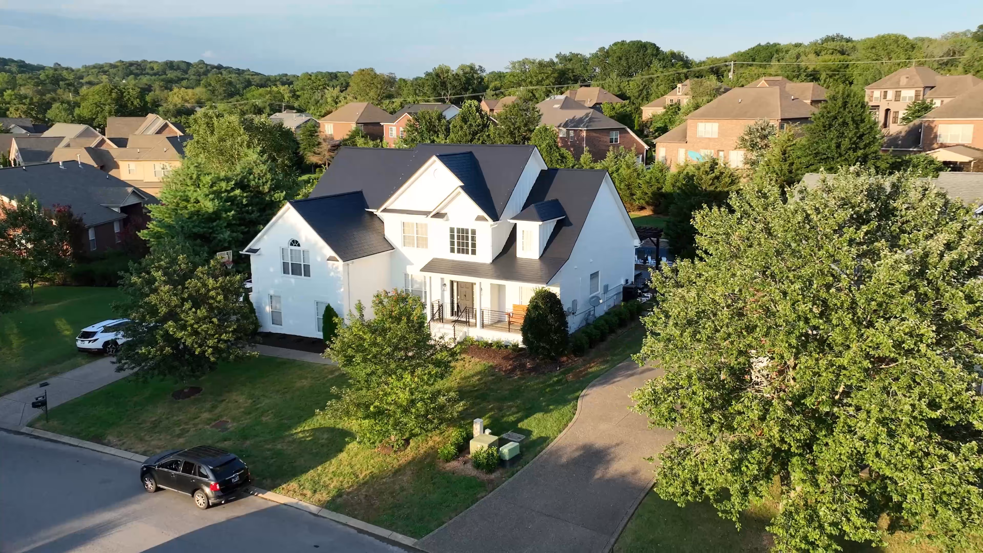 Black Aluminum Shingle Suburban Family Home