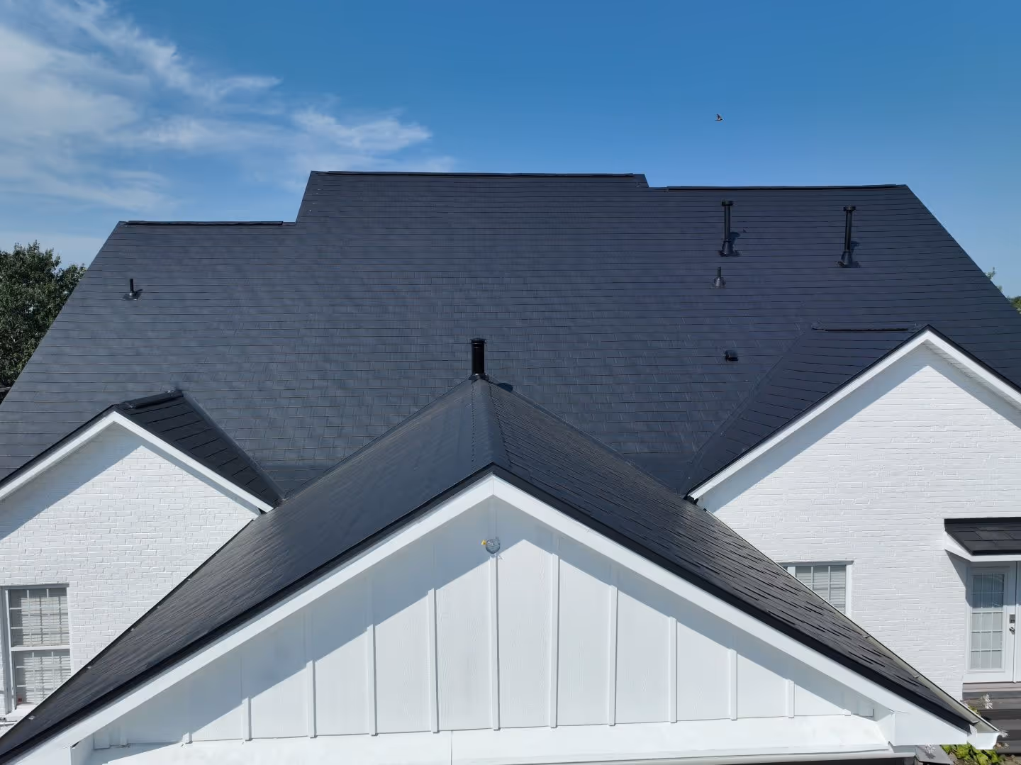 Black Aluminum Shingle Suburban Family Home