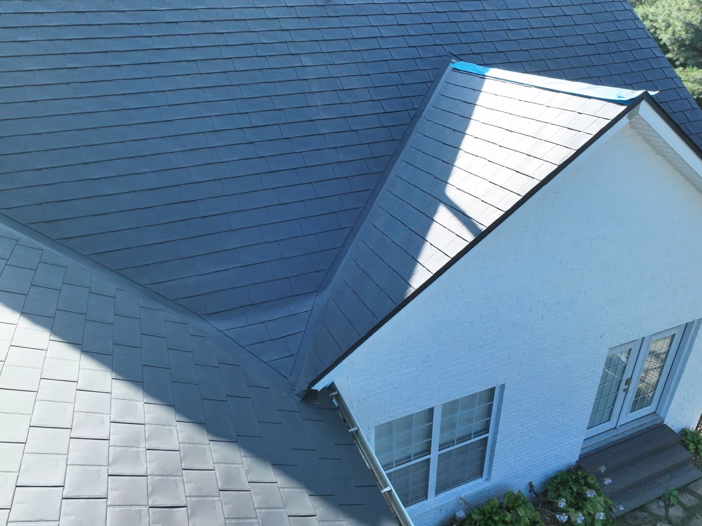 Black Aluminum Shingle Suburban Family Home