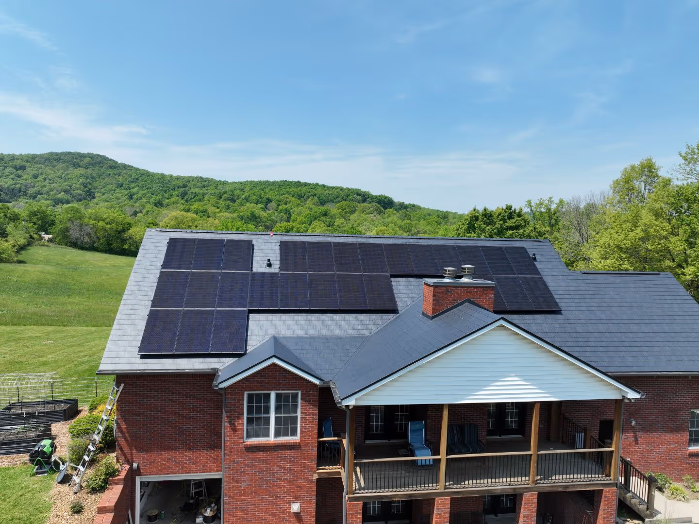 Black Aluminum Shingle Roof With Solar Panel System