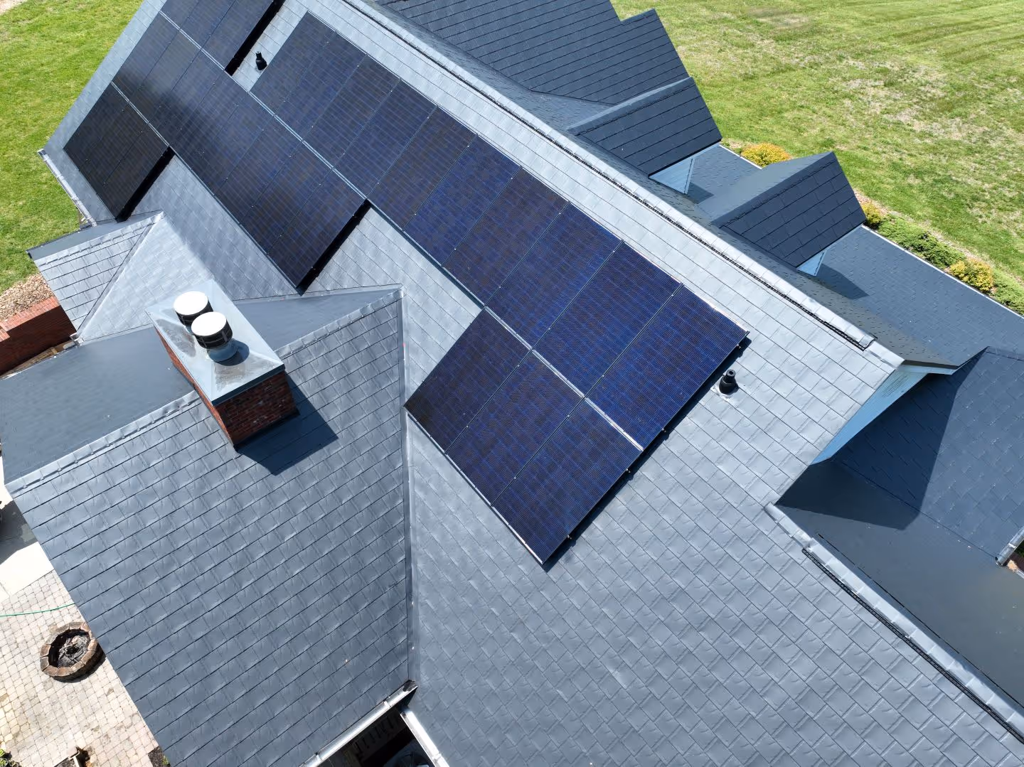 Black Aluminum Shingle Roof With Solar Panel System