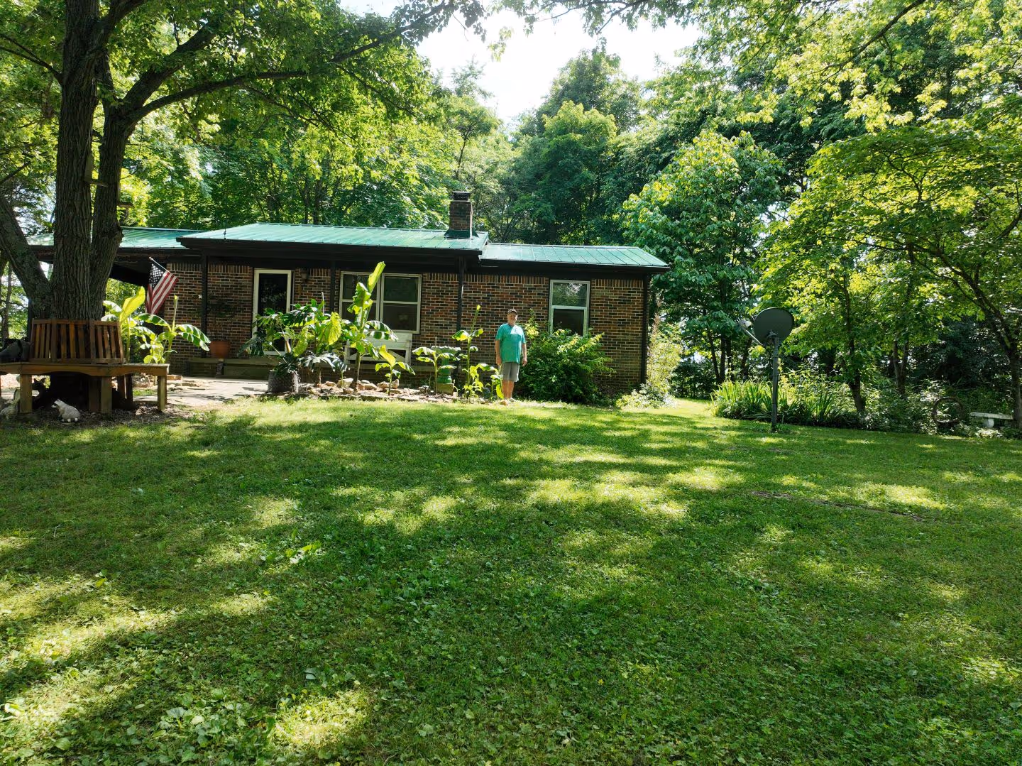 Green Classic Panel Forested Home