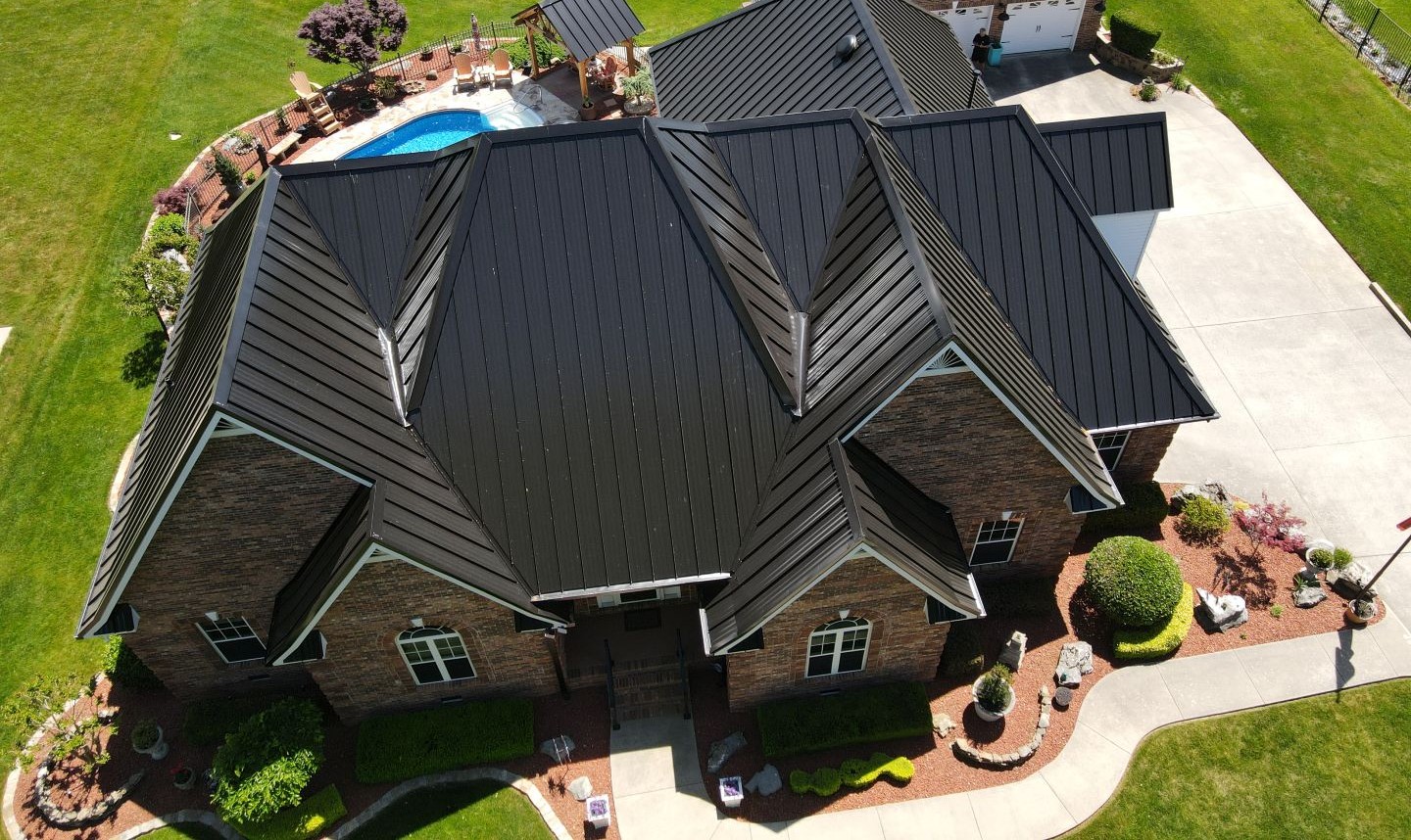 Nashville Brick Home with a Black Standing-Seam Metal Roof