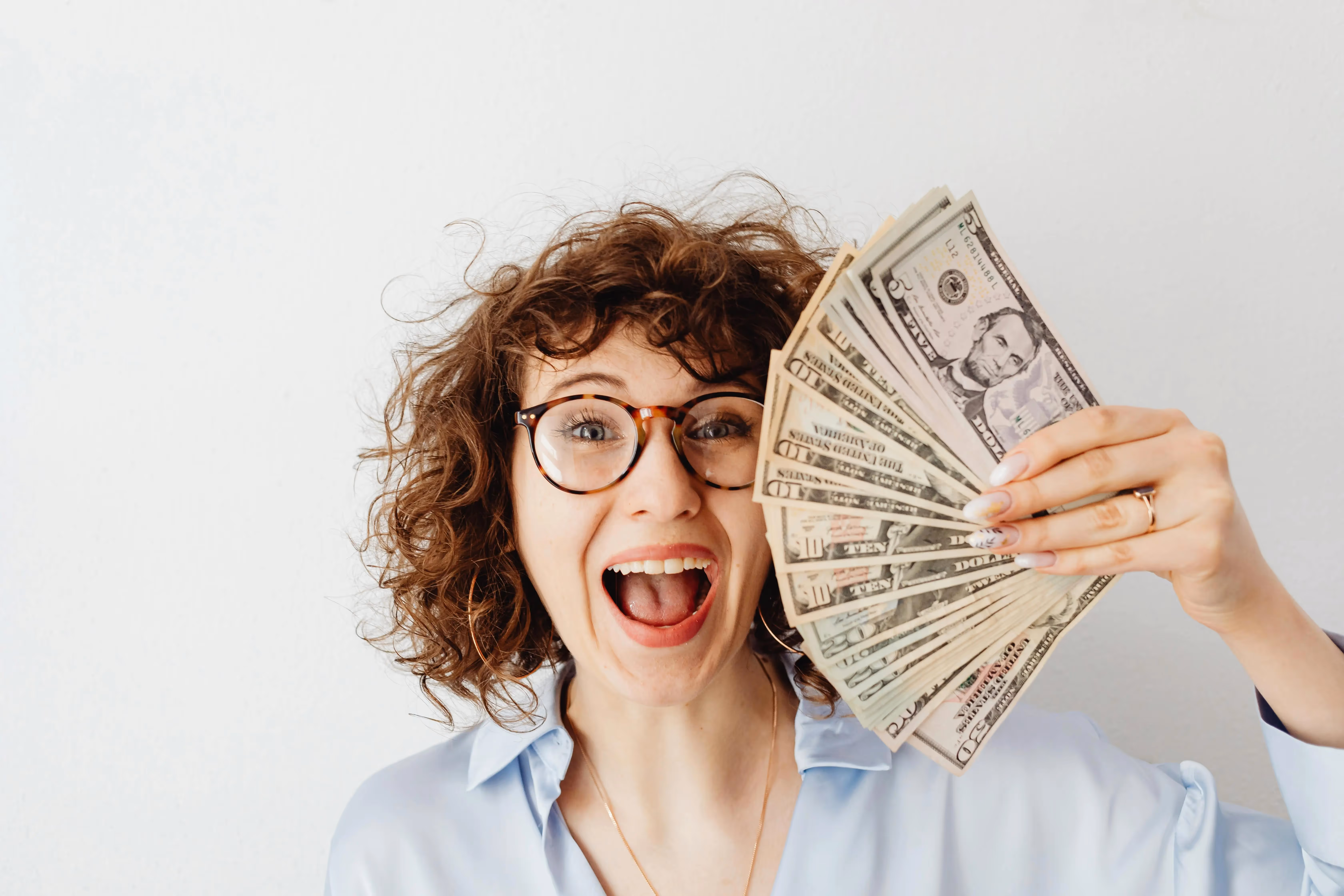 Chase Freedom Unlmited Woman Holding Cash