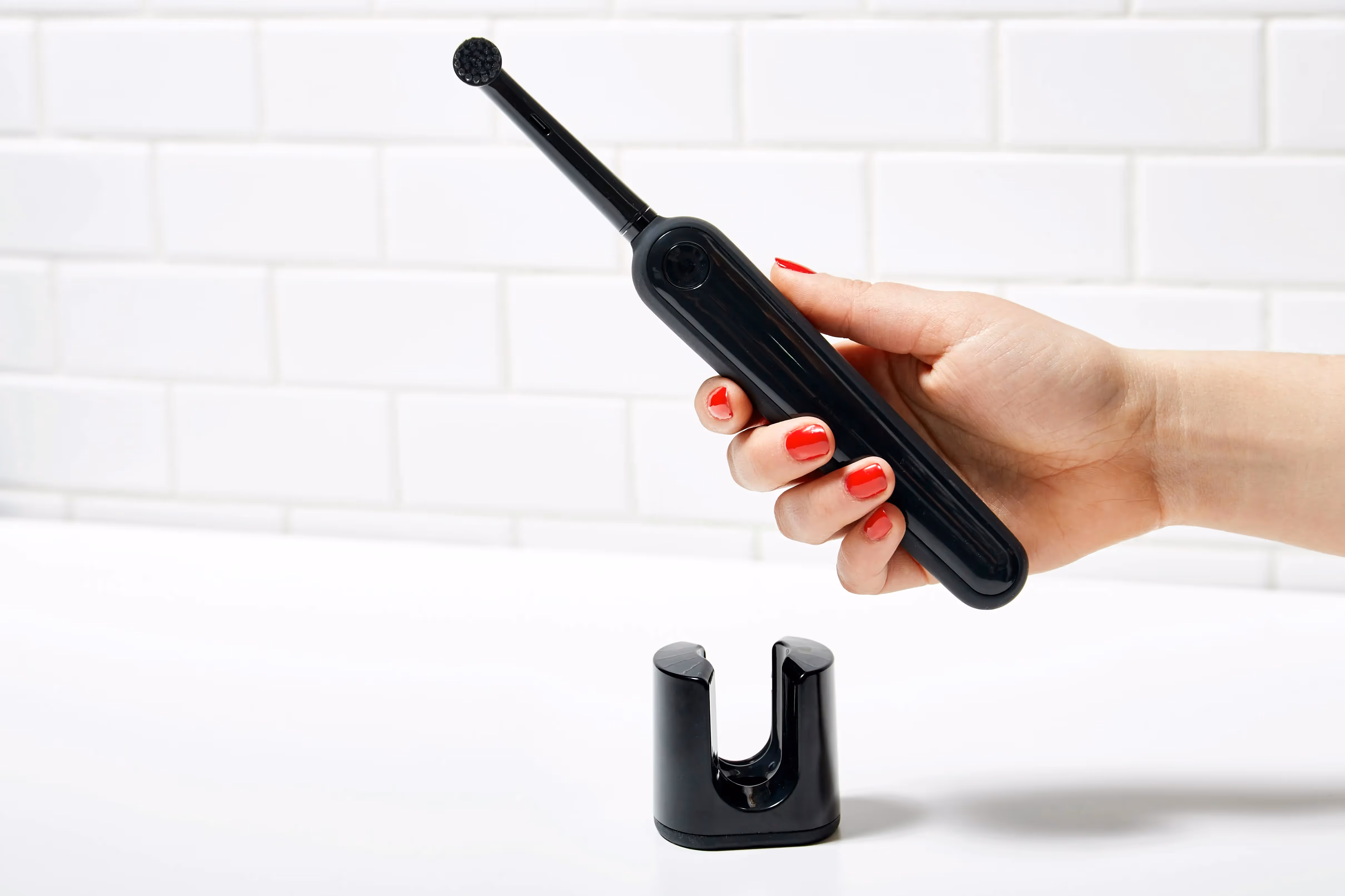 A black electronic toothbrush