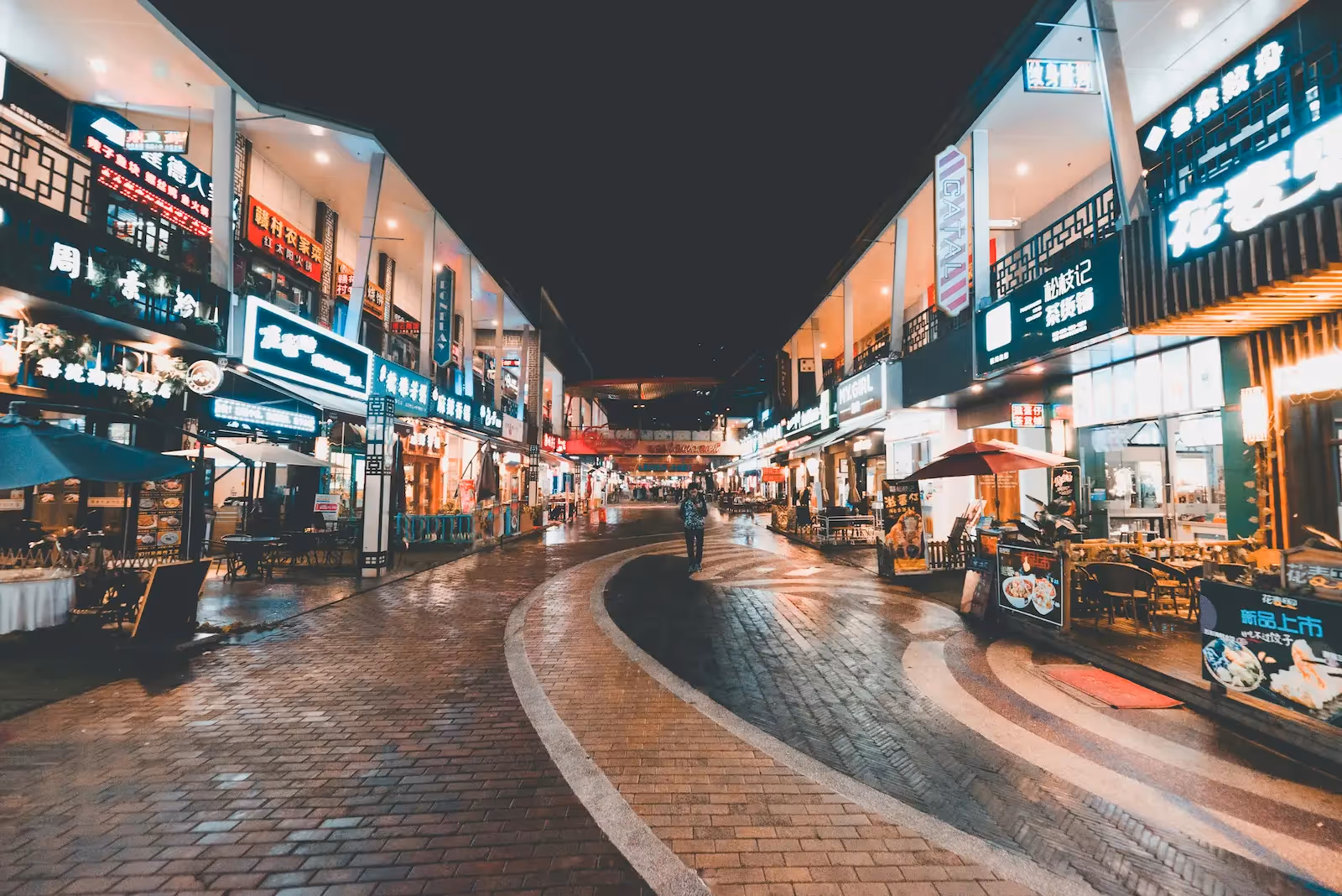 Various businesses photographed at night