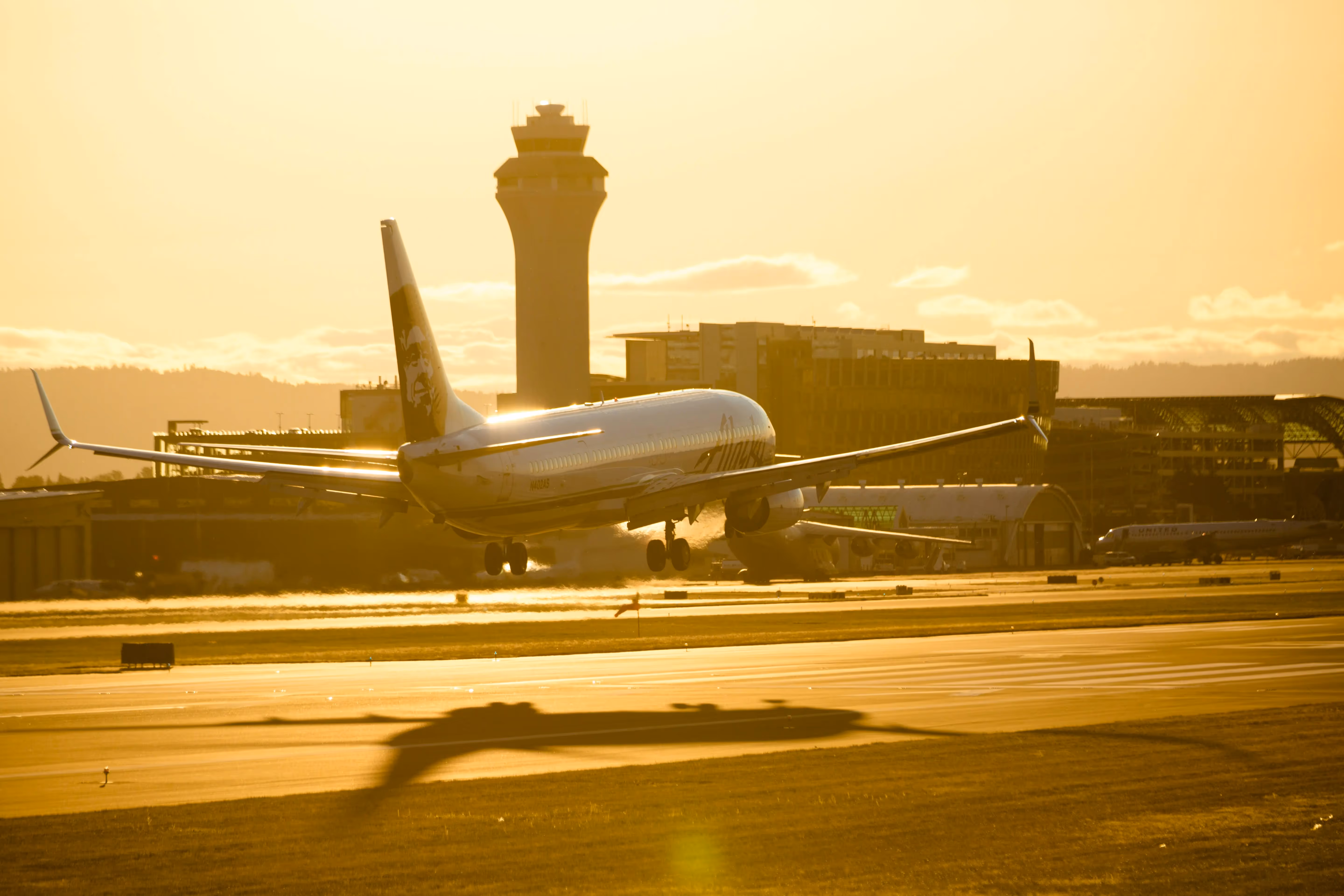 Airplane taking off during daytime