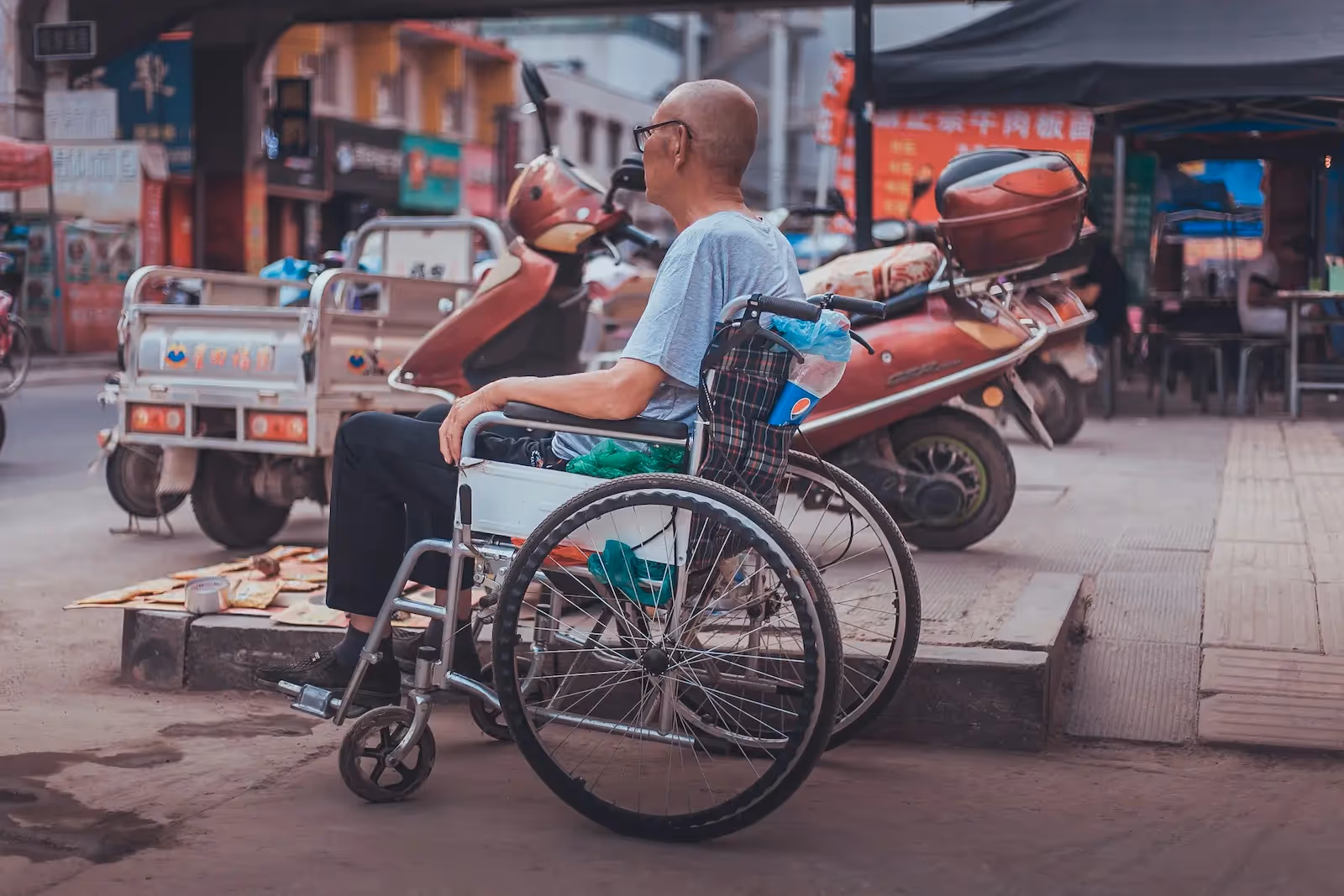 Man sitting on a wheelchair