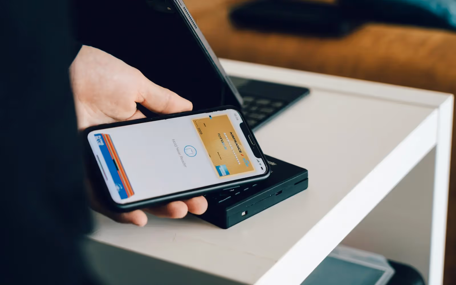 A photo of a person using Apple Pay