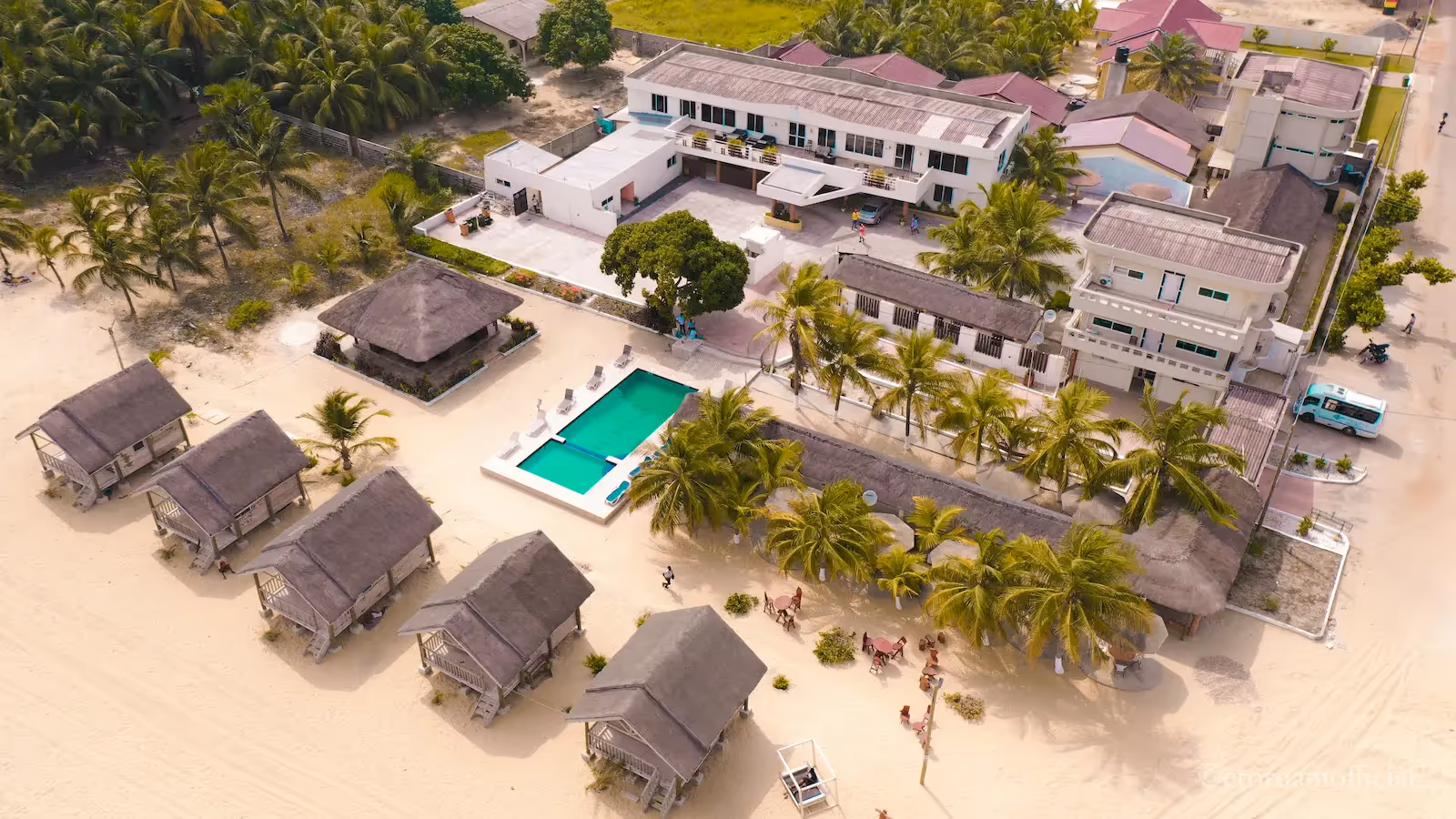 Aerial view of a resort with a pool