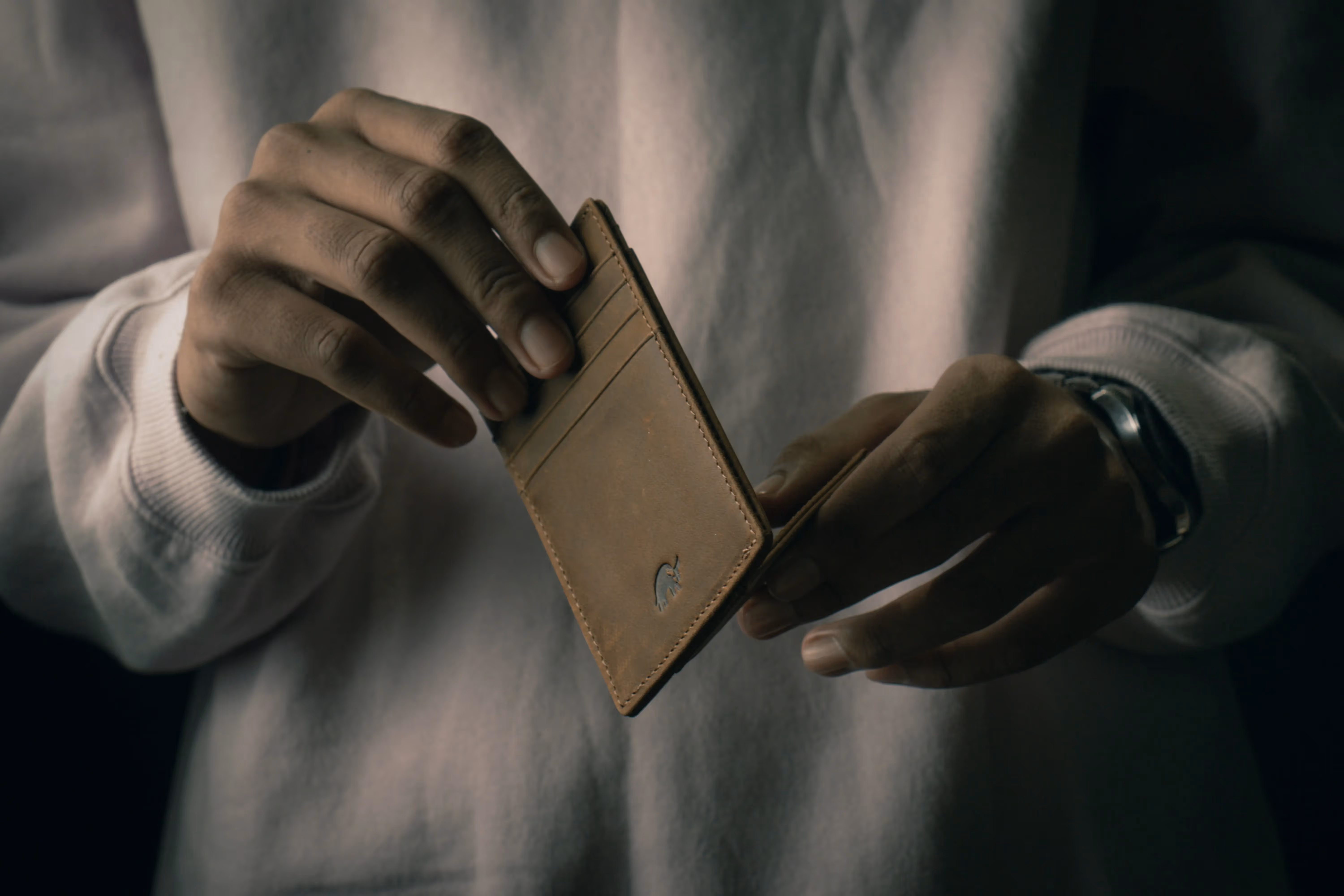 Person holding a cardholder