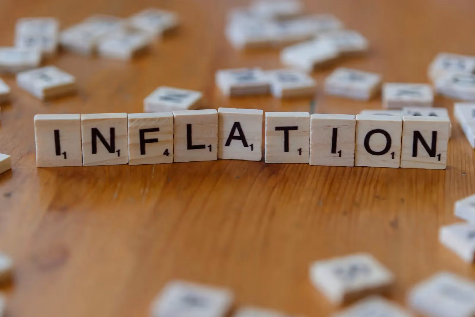 Inflation spelled using scrabble tiles