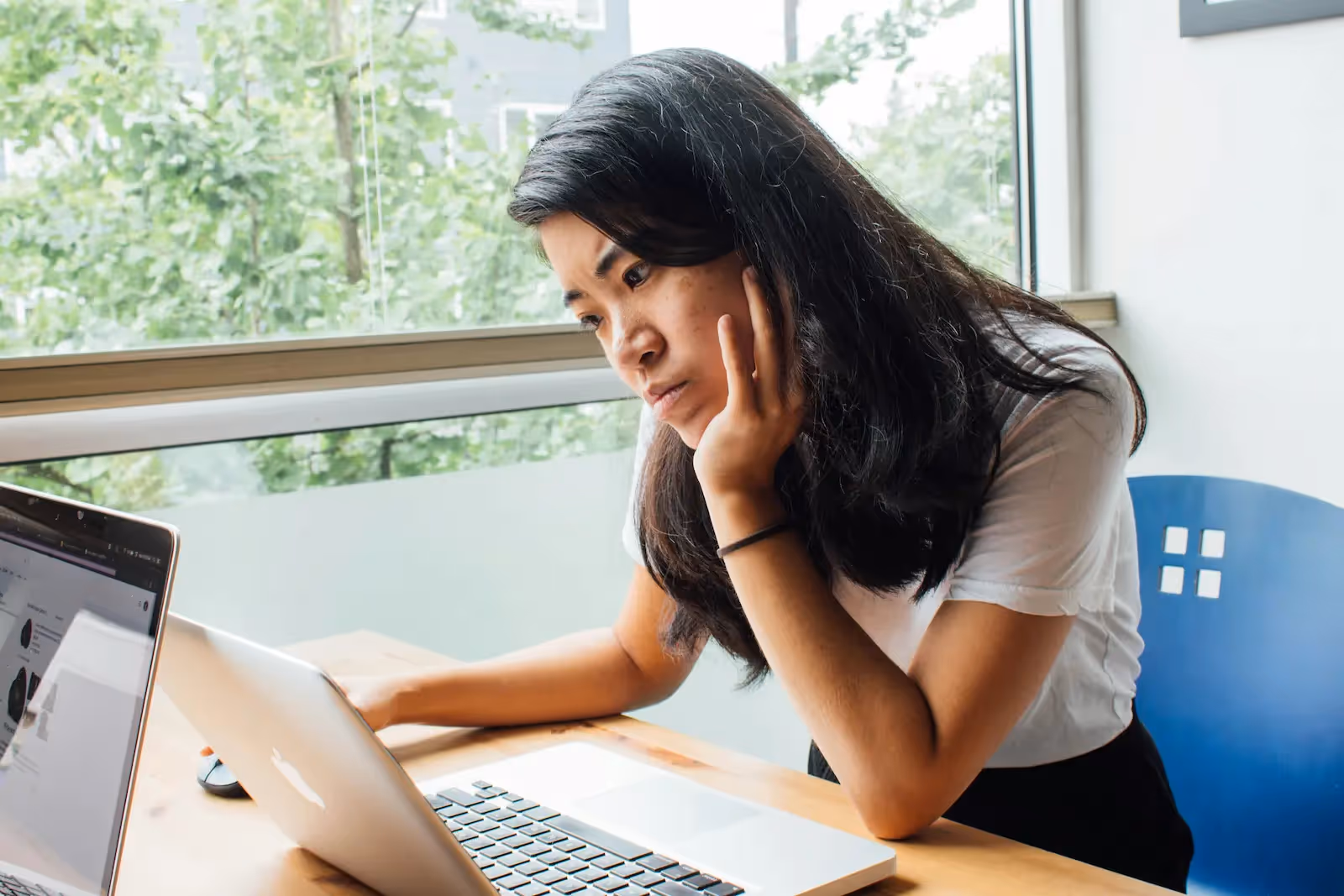 Person looking at a laptop's screen