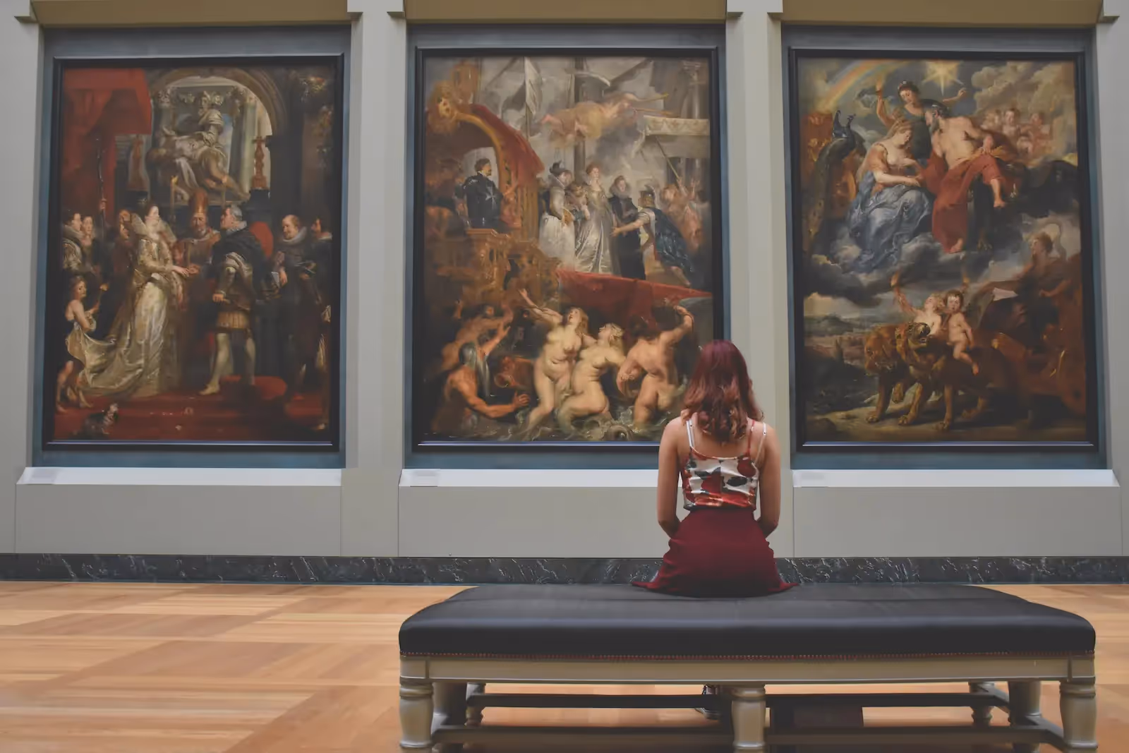 Person sitting inside a museum