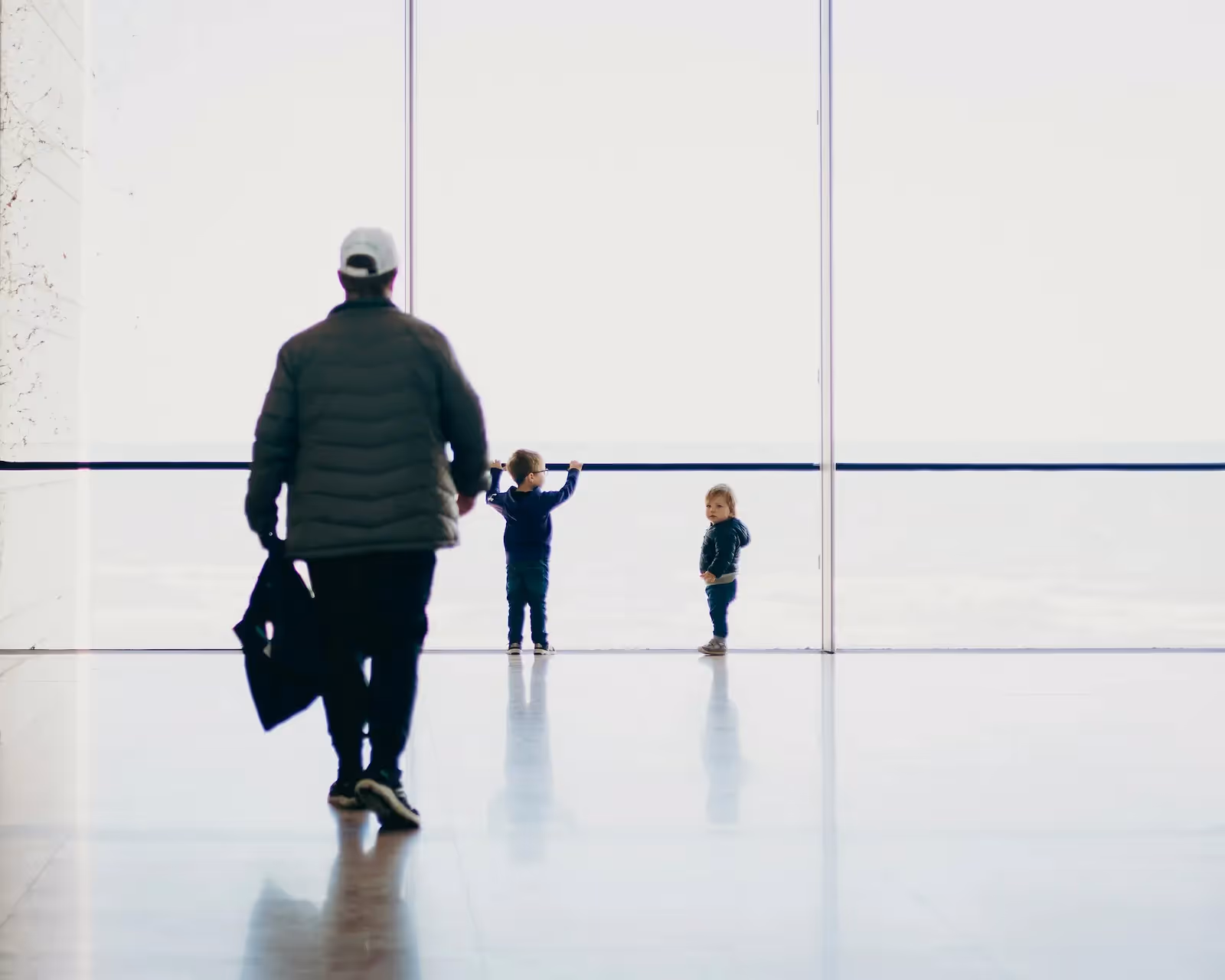 Person and two toddlers