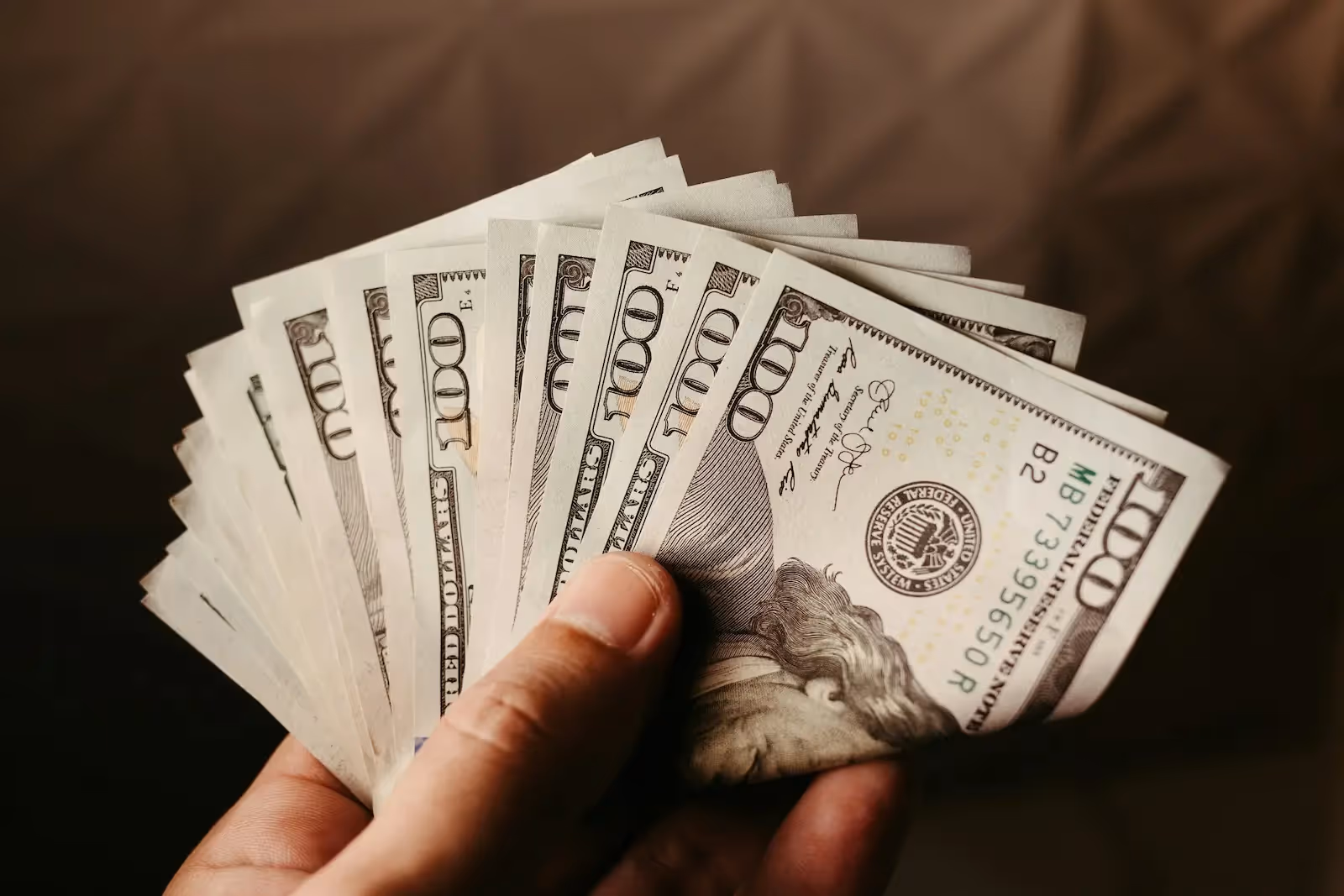 Person holding money