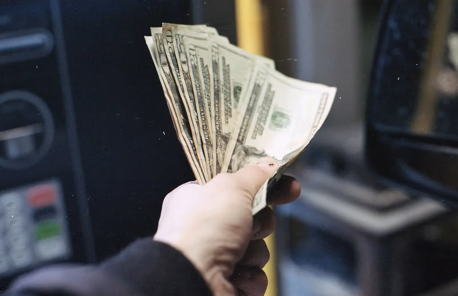 Person holding cash