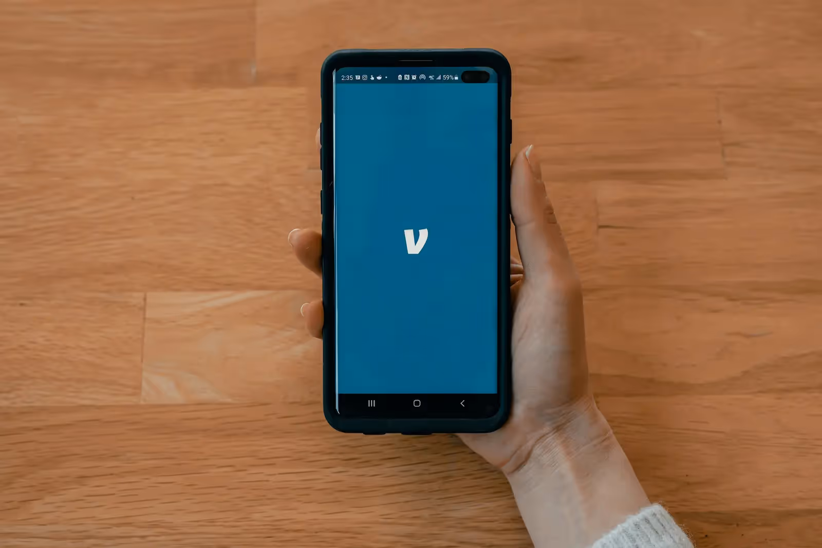 Person holding a phone