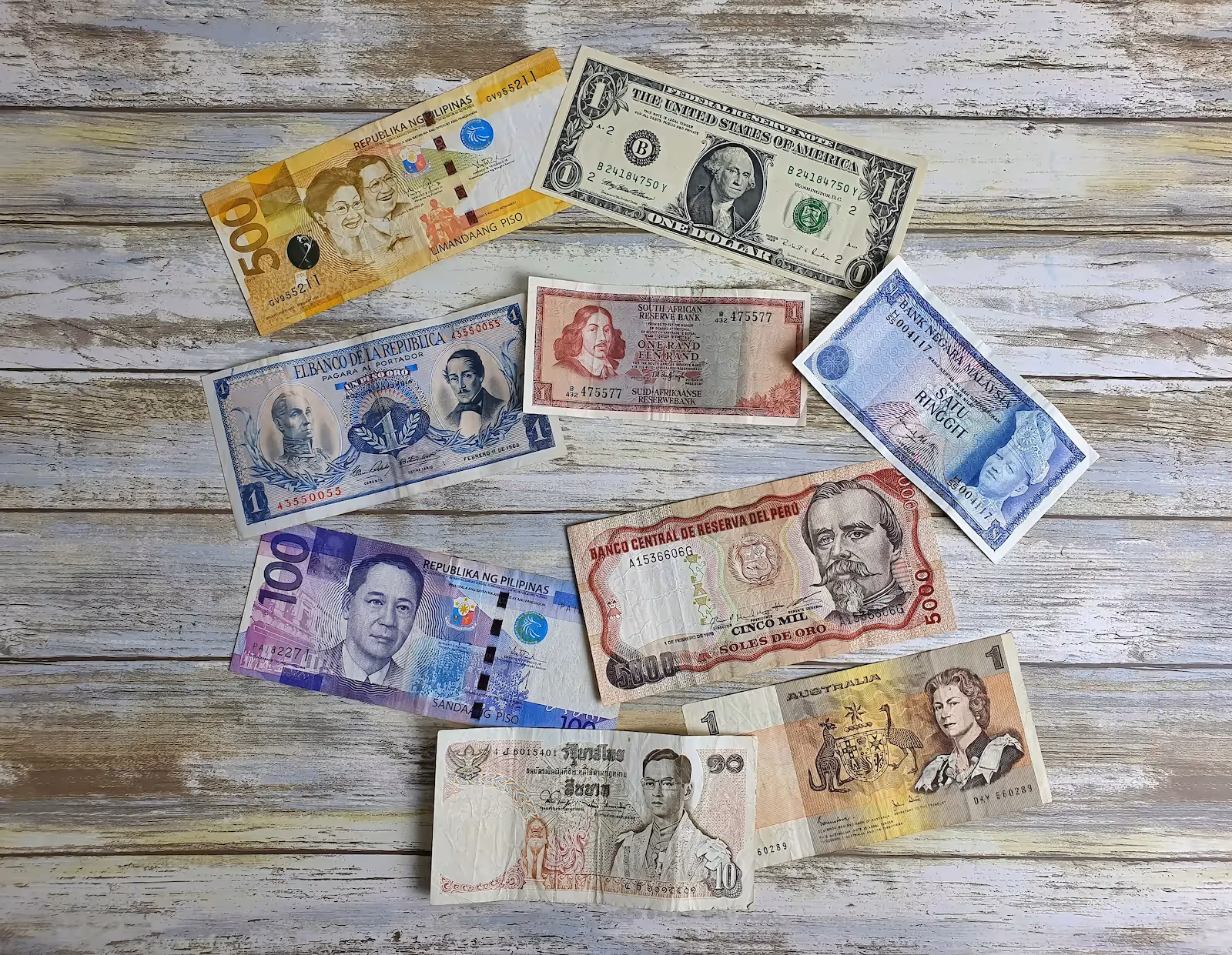 Different paper bills on a surface