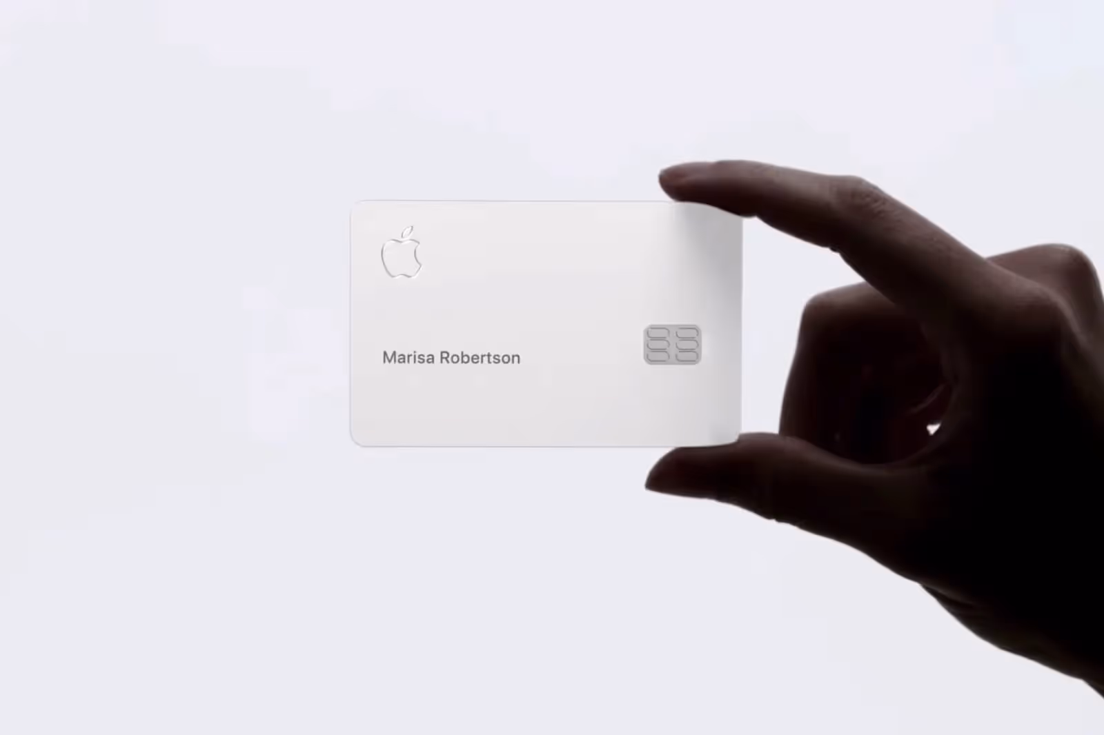 Person holding an Apple Card