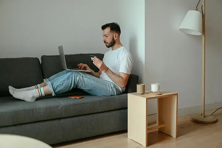 Man shopping on his laptop