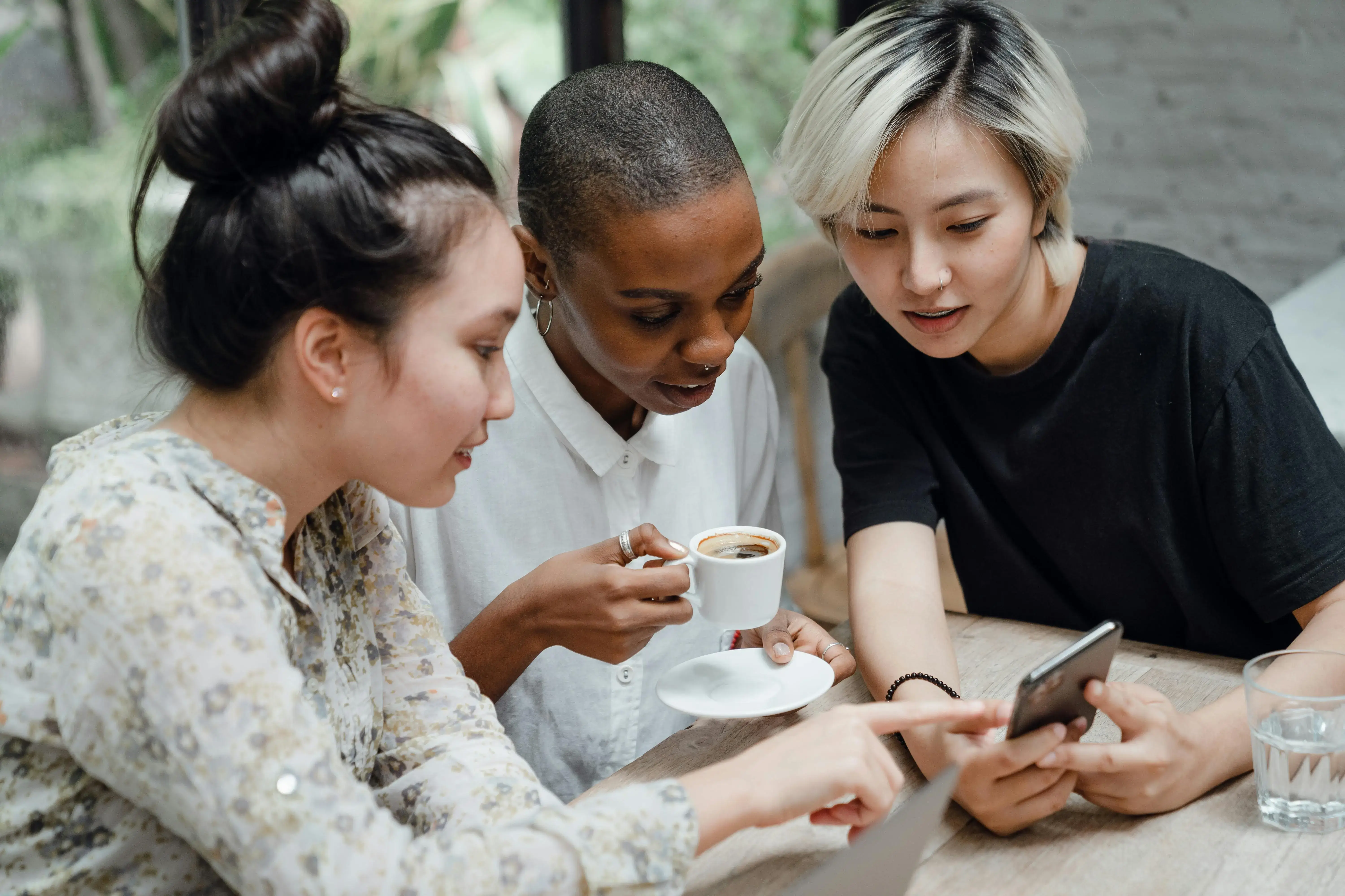 Three people discussing
