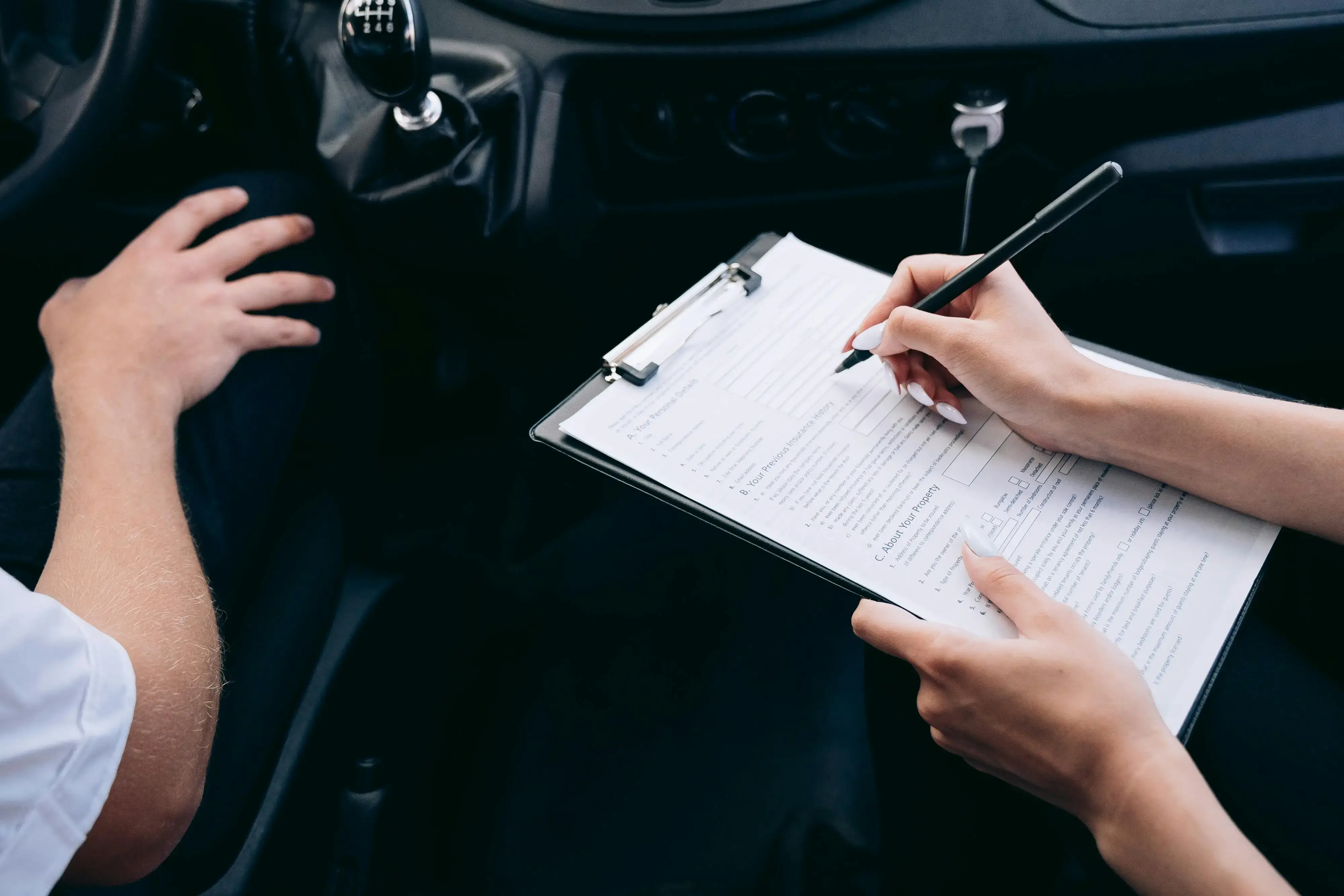Two people inside a car