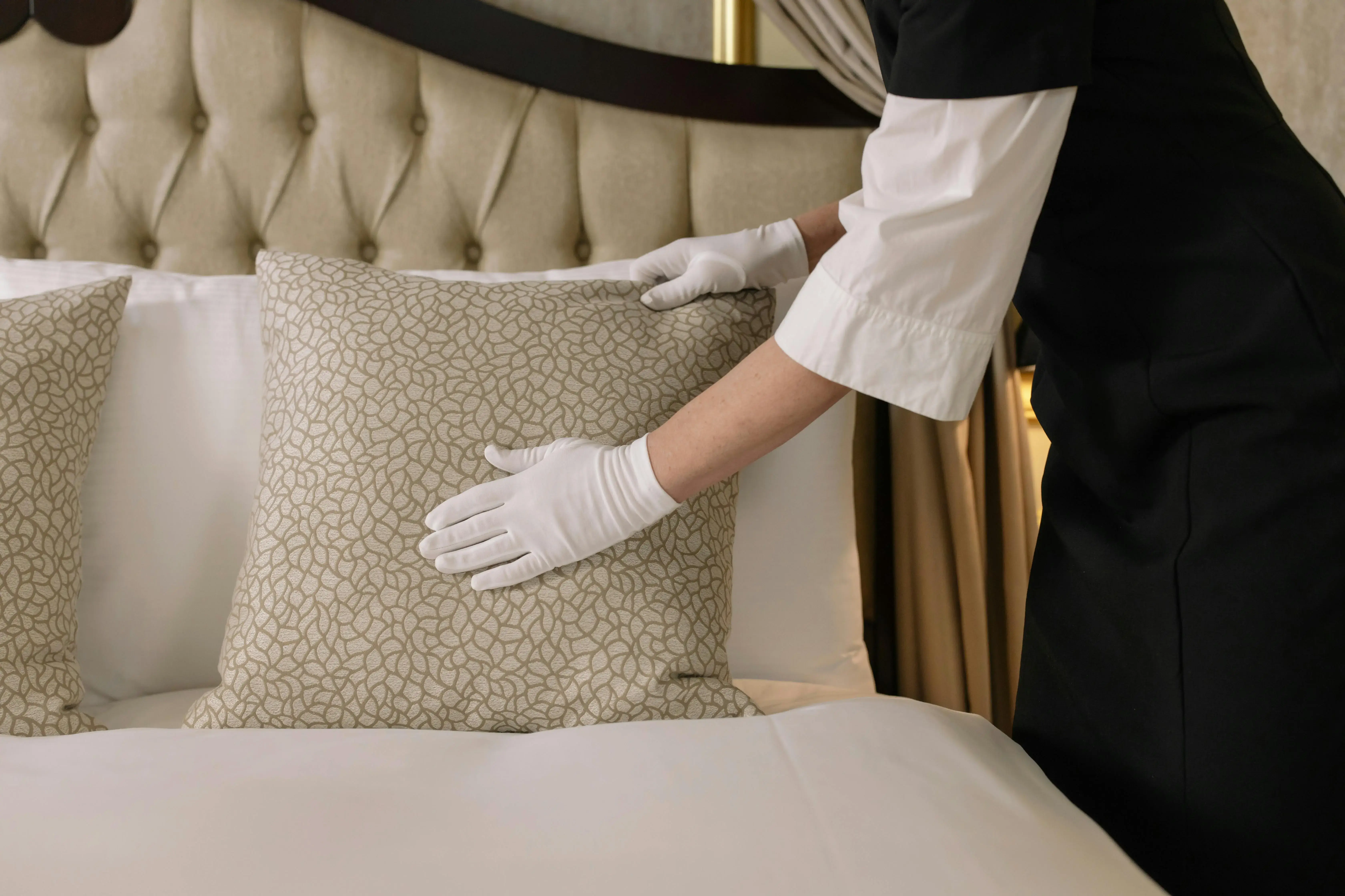 Person touching a pillow