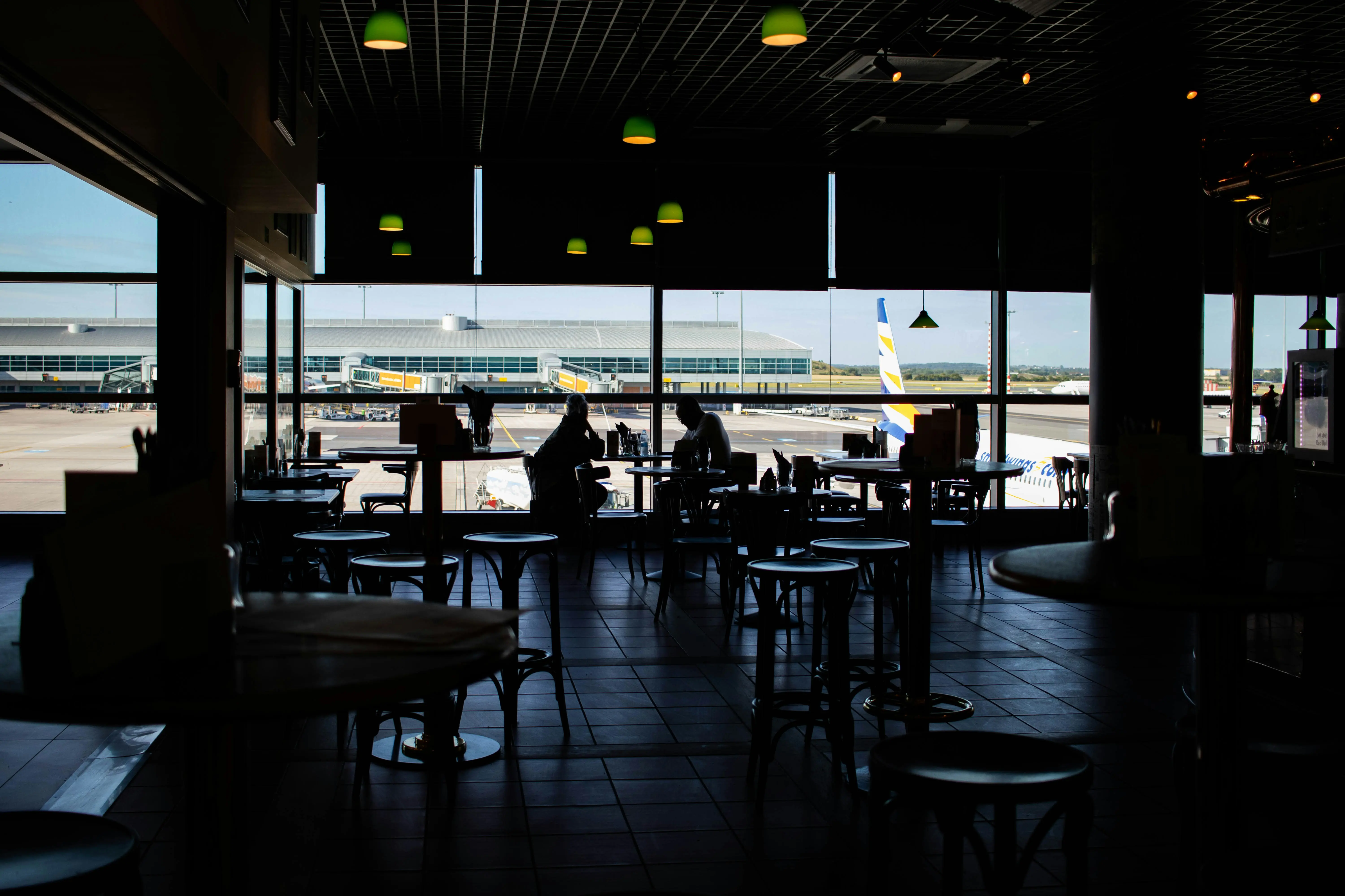 People at an airport's lounge