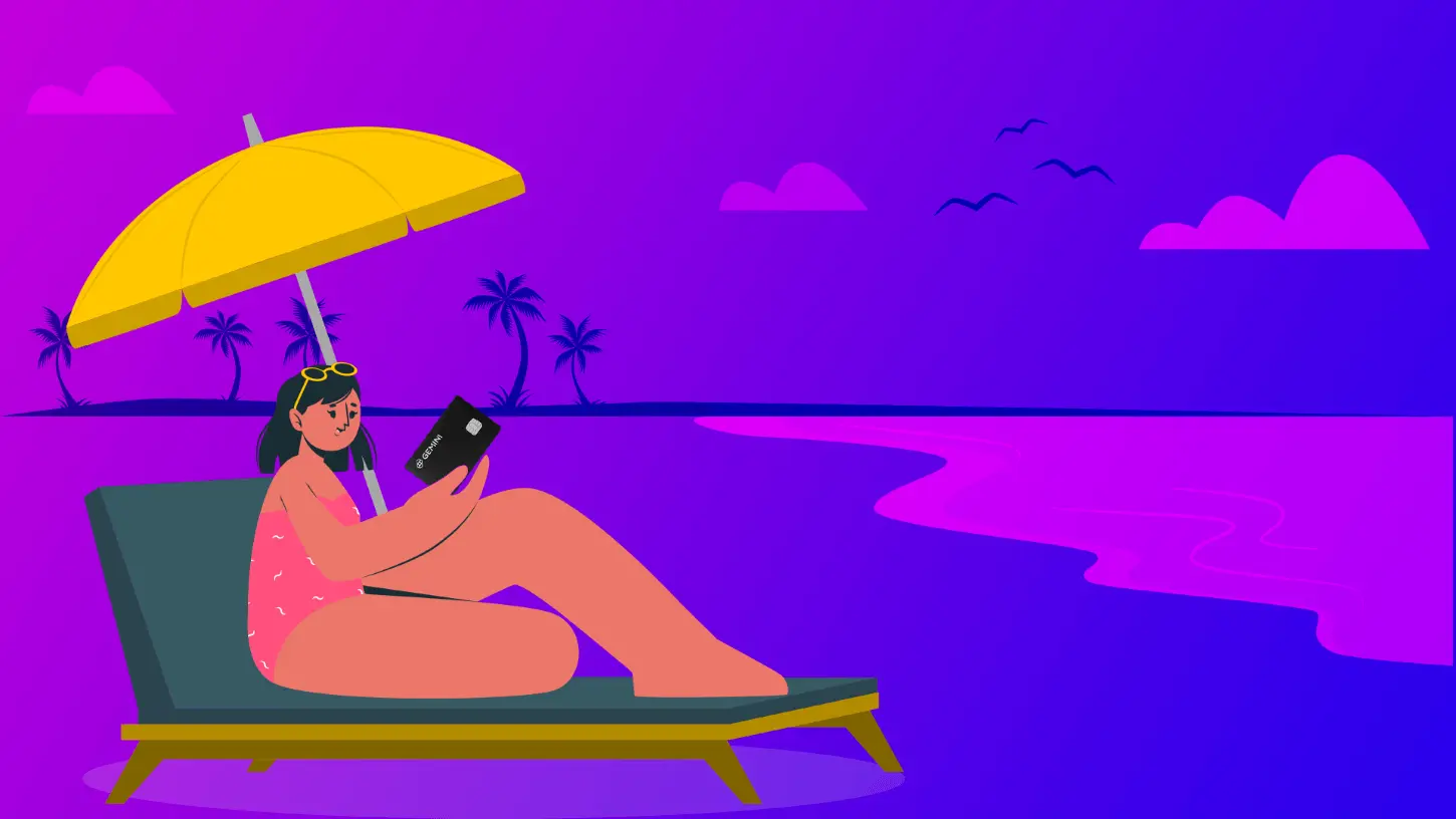 A woman suntanning on the beach with her Gemini Credit Card