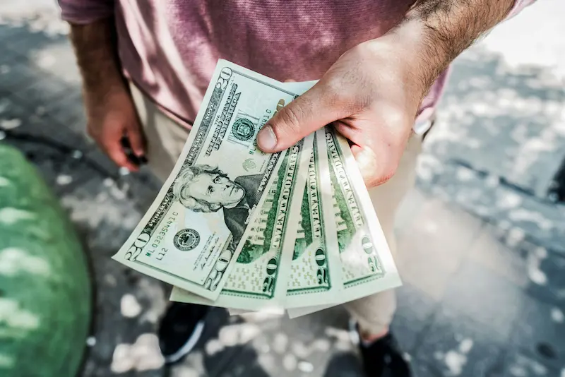 Credit card issuer classifying Western Union money transfer as cash advance triggering immediate interest accrual with no grace period and no rewards earned