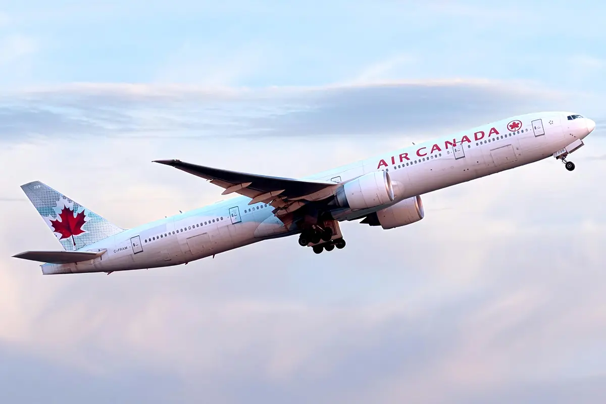 Air Canada plane taking off representing Chase Aeroplan credit card 75000 bonus points welcome offer April 2026