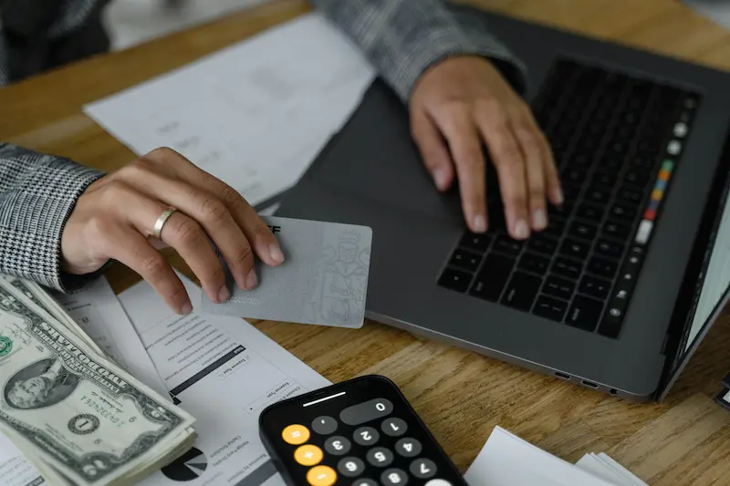 Should you use a credit card for ACH payments in 2026 showing rewards versus processing fee calculation