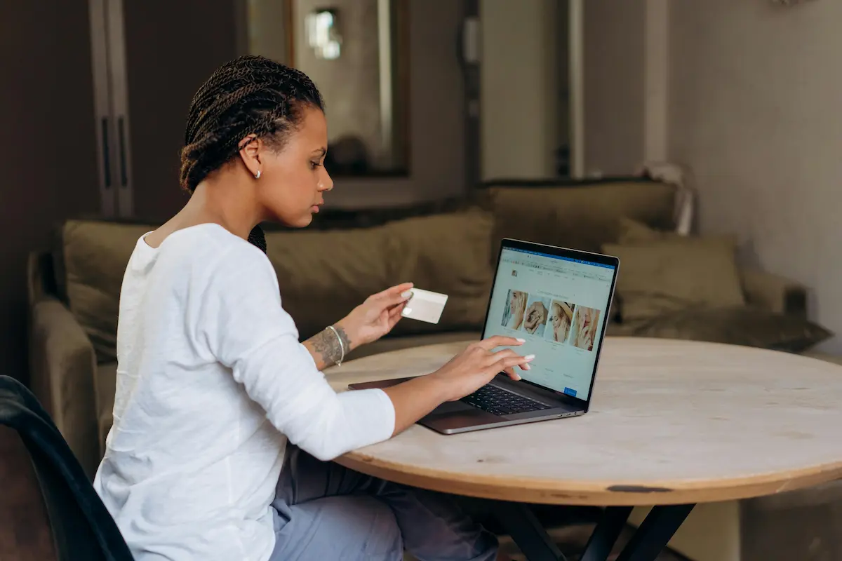 Person reviewing Concora Credit card offer for Destiny Milestone and Indigo Mastercard in 2026