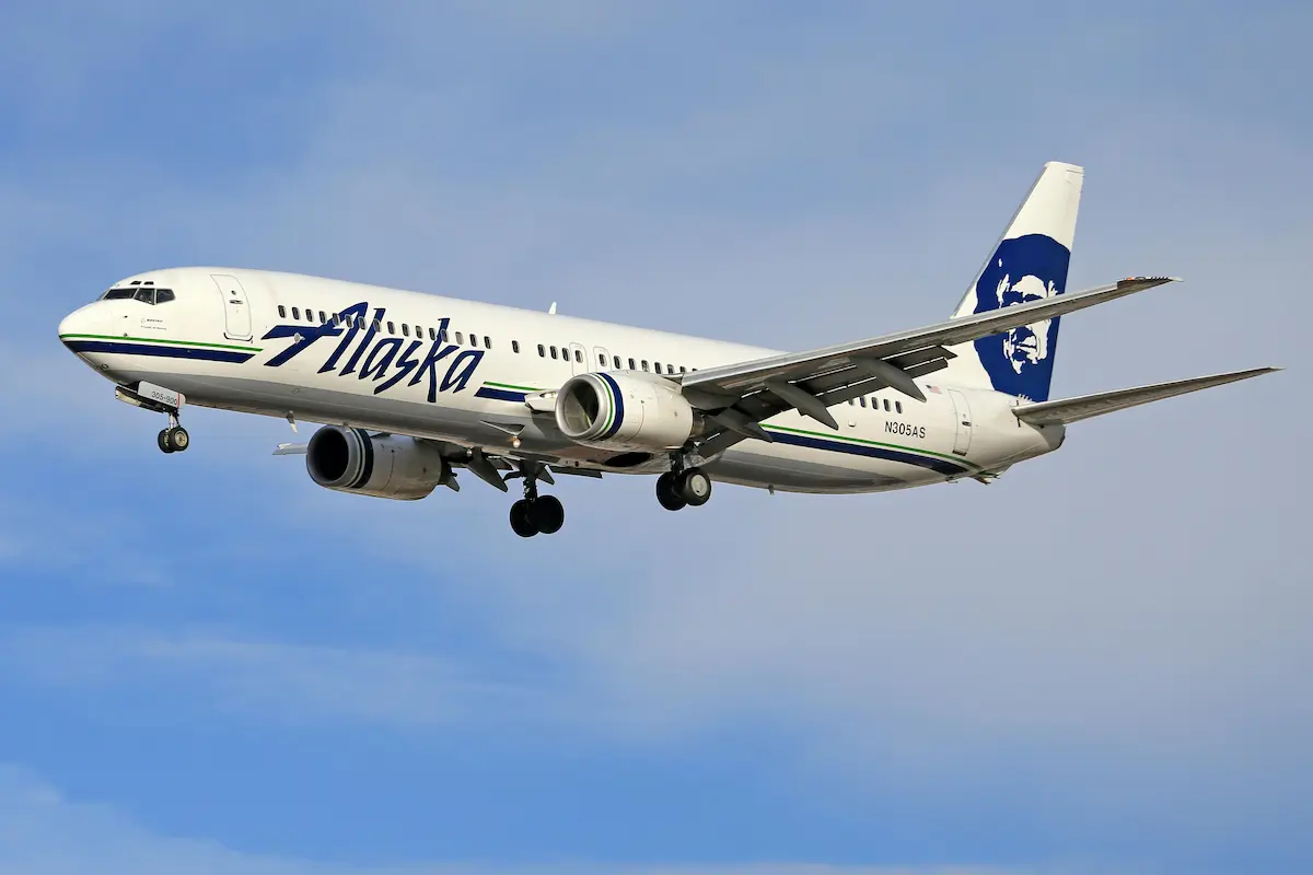 Atmos Rewards Summit Visa Infinite Card review 2026 — Alaska Airlines plane at Seattle-Tacoma airport