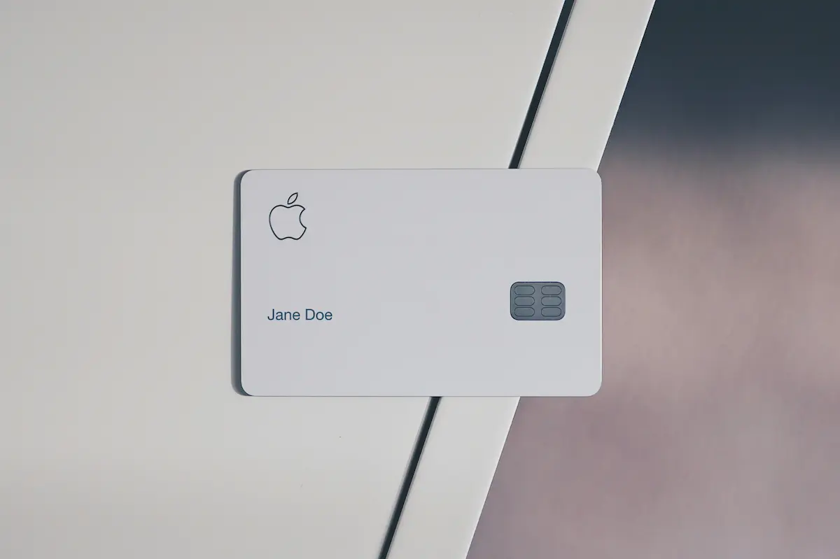 Titanium Apple Card resting on a light gray surface