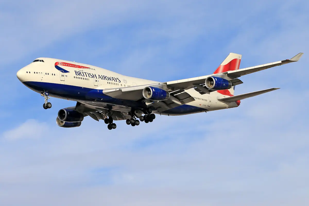 British Airways Boeing 747 aircraft flying against a blue sky