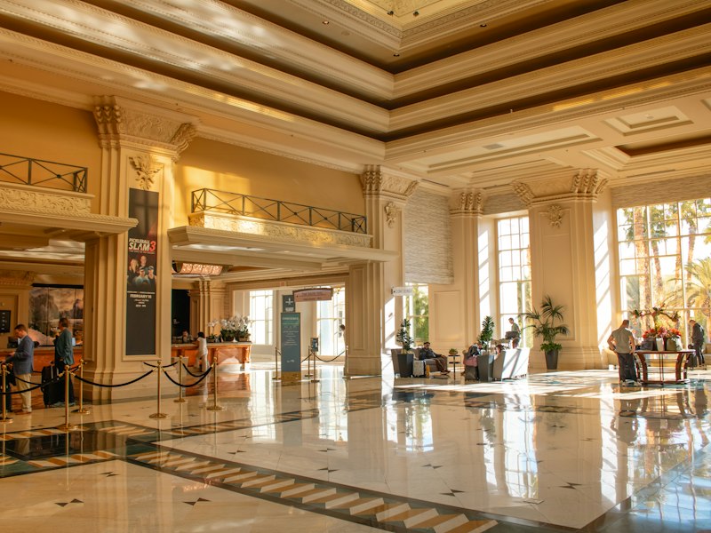 Sunlit grand hotel lobby representing a Leading Hotels of the World property